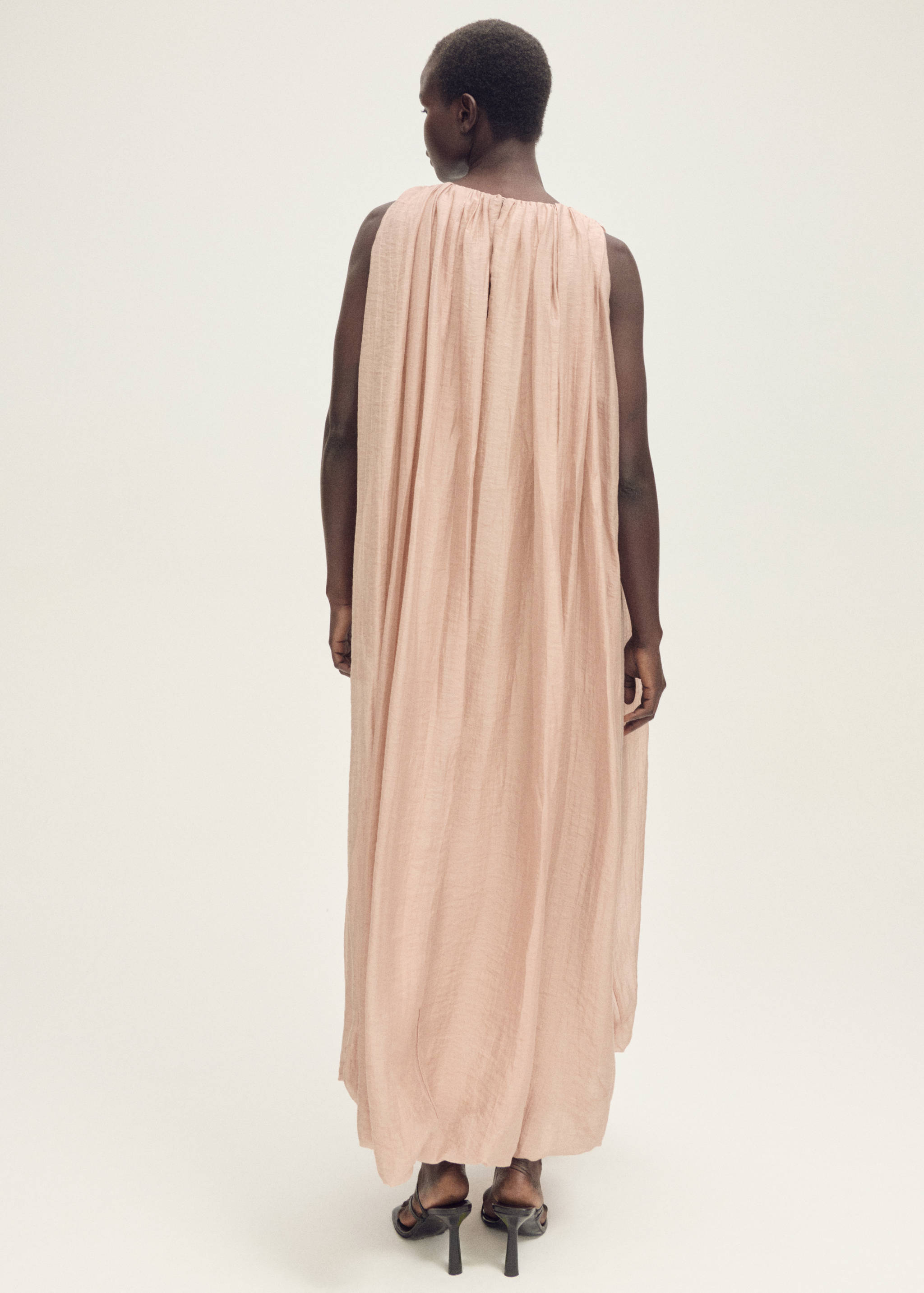 Gathered dress with puffed hem - Reverse of the article