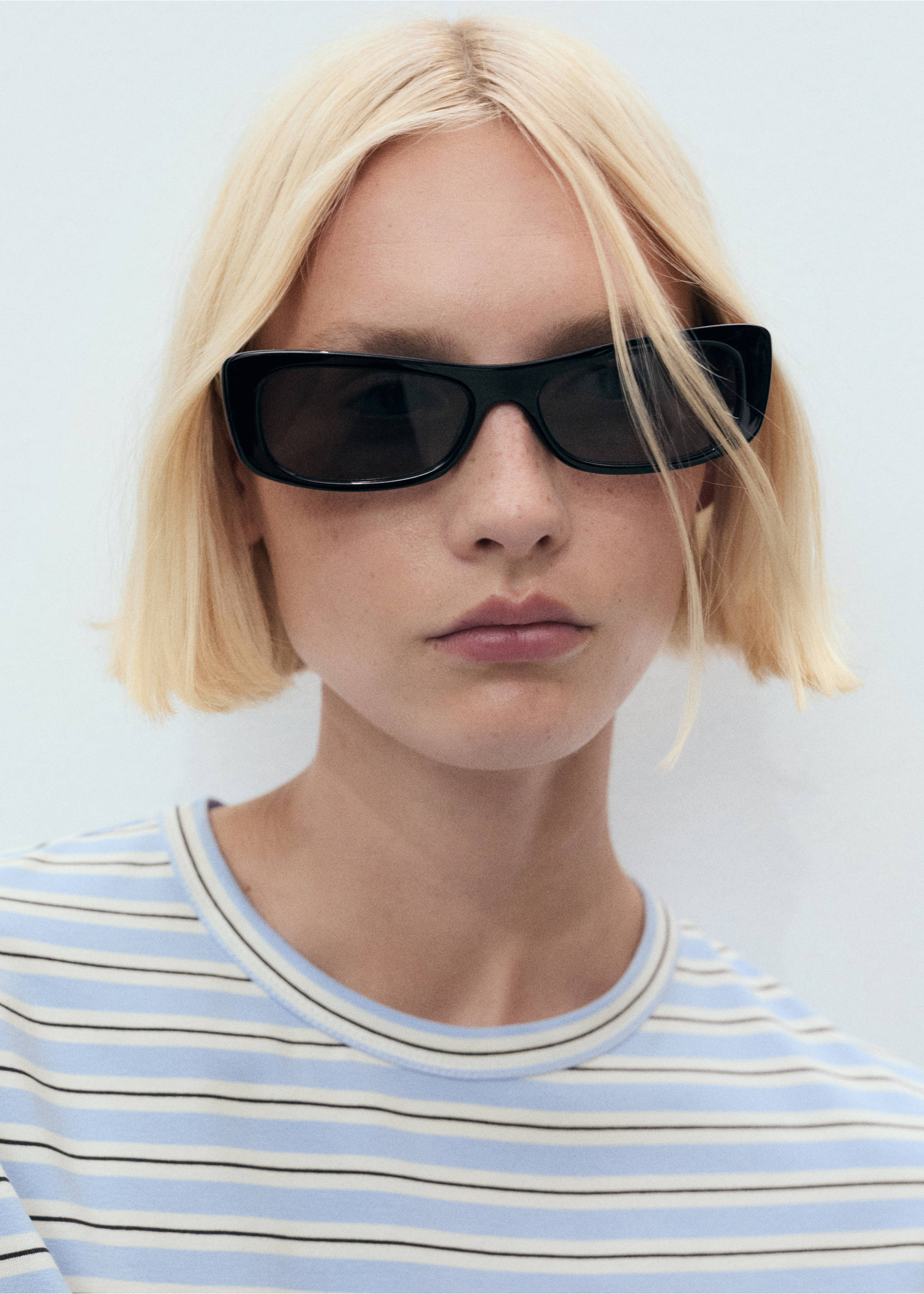 Short striped dress with knot - Details of the article 1, Sky Blue. Ref: 87078651-00.