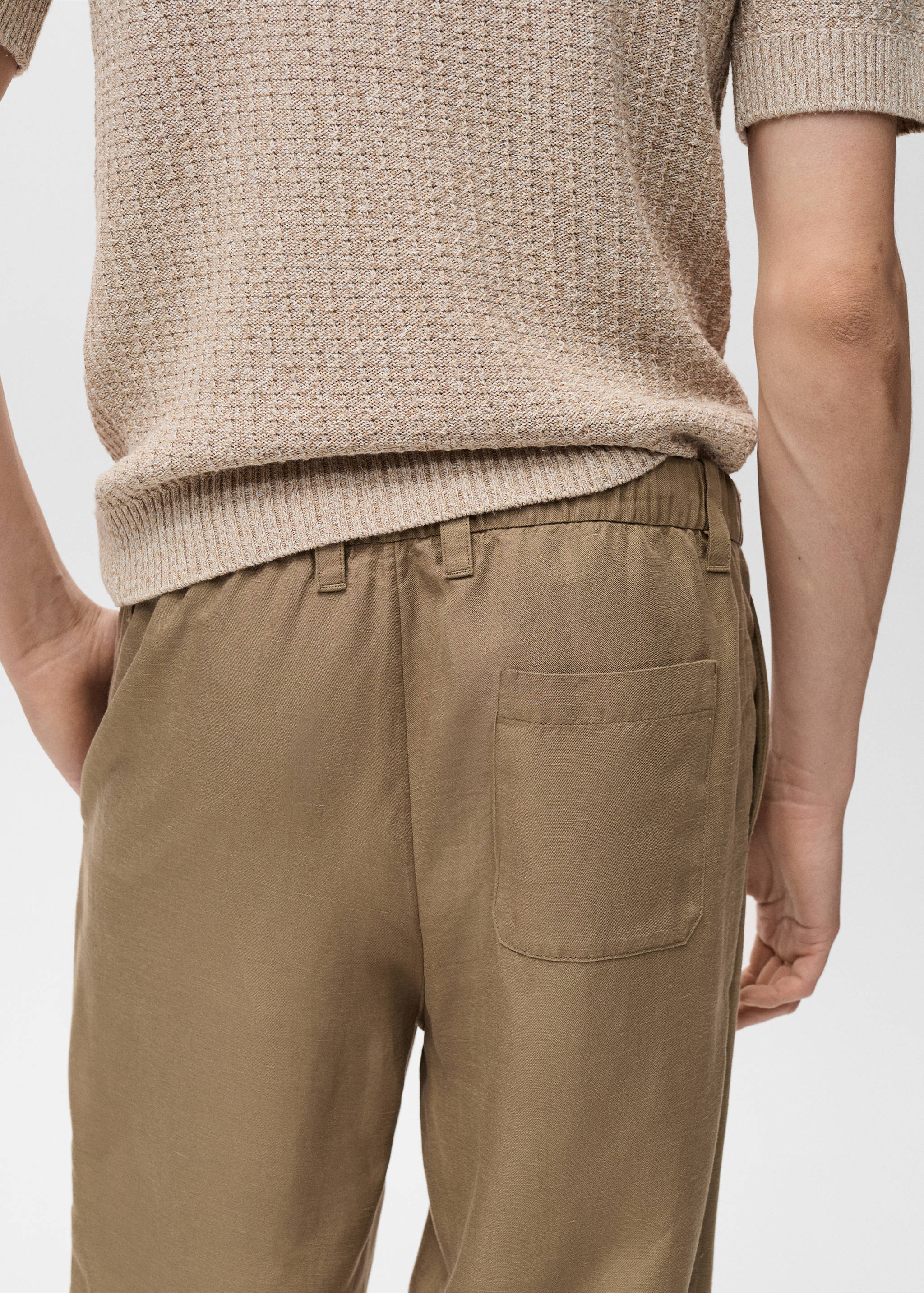 Linen-blend trousers with an elastic waistband - Details of the article 6, Ochre. Ref: 87079204-00.
