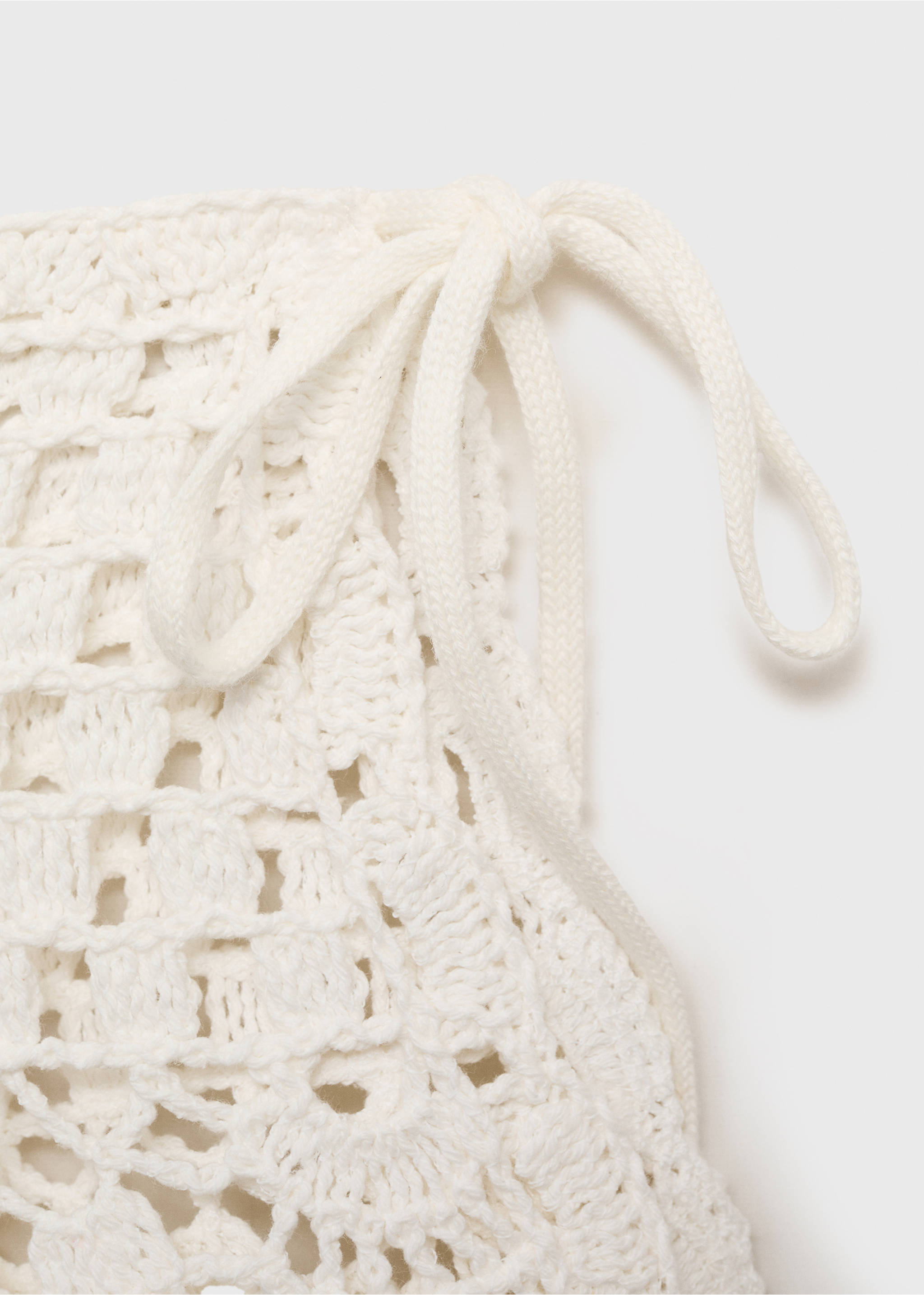 Crochet bow mini-skirt - Details of the article 0, White. Ref: 87079212-00.