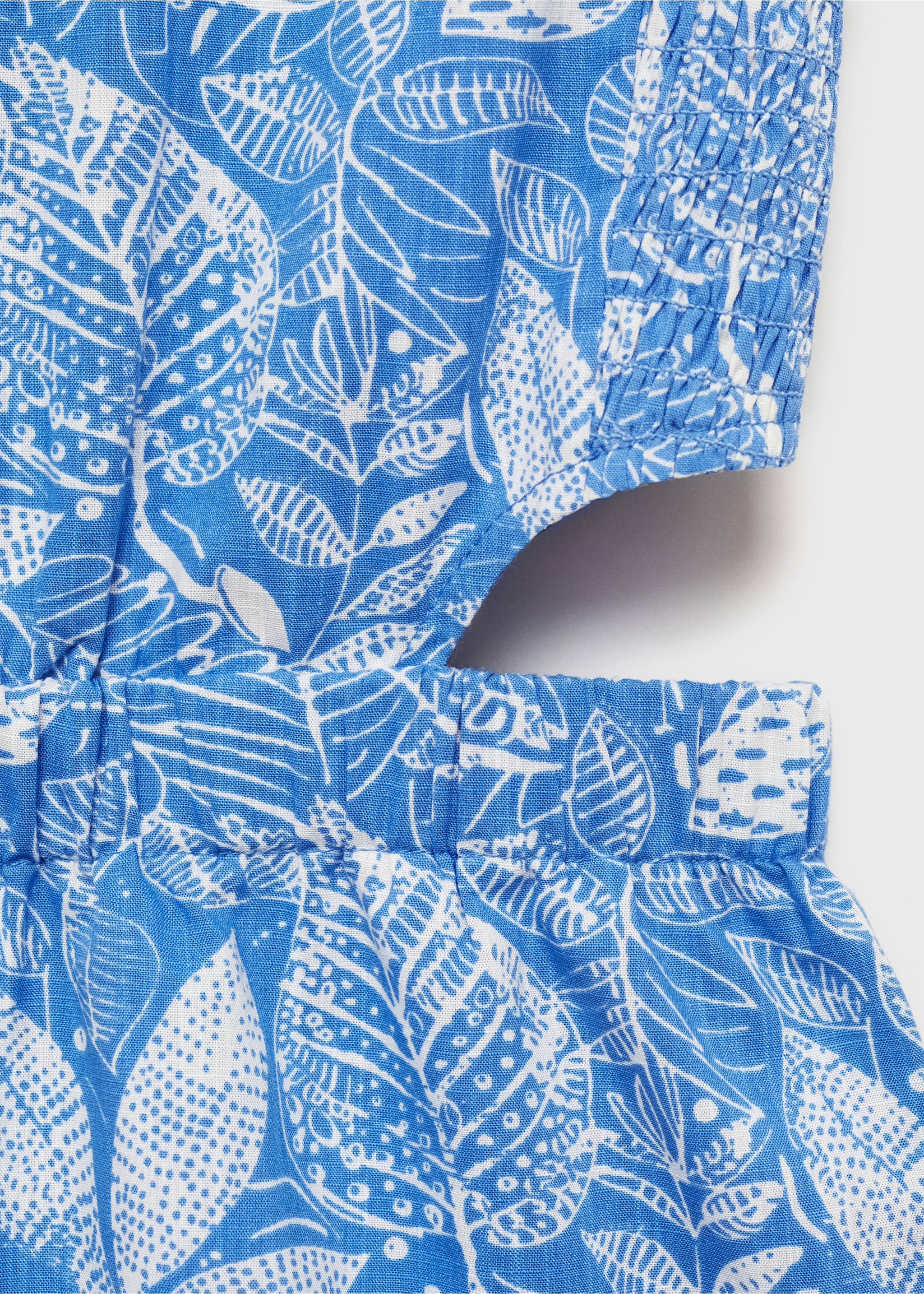 Printed jumpsuit with openings - Details of the article 8, Blue. Ref: 87080641-00.