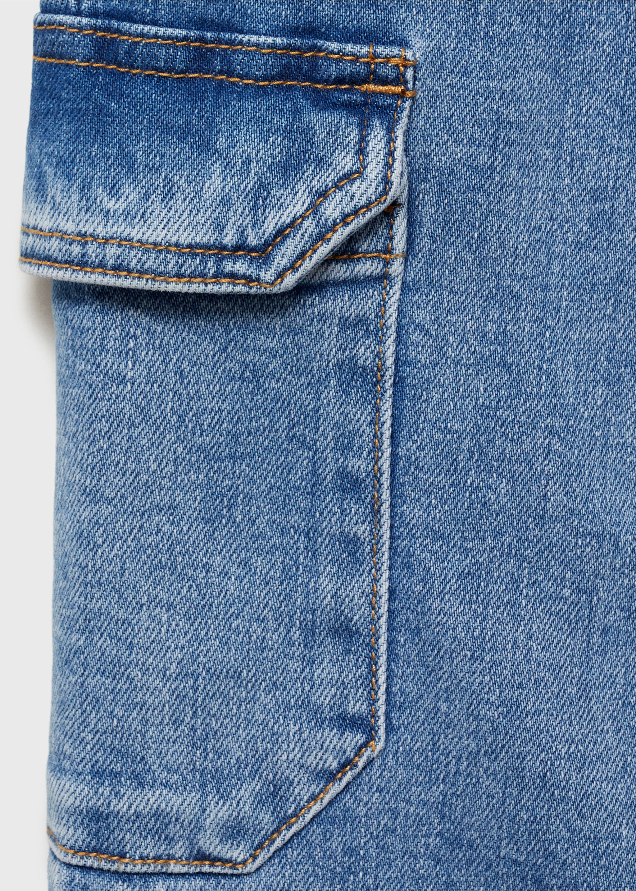 Flared cargo jeans - Details of the article 8, Medium Blue. Ref: 87083269-00.