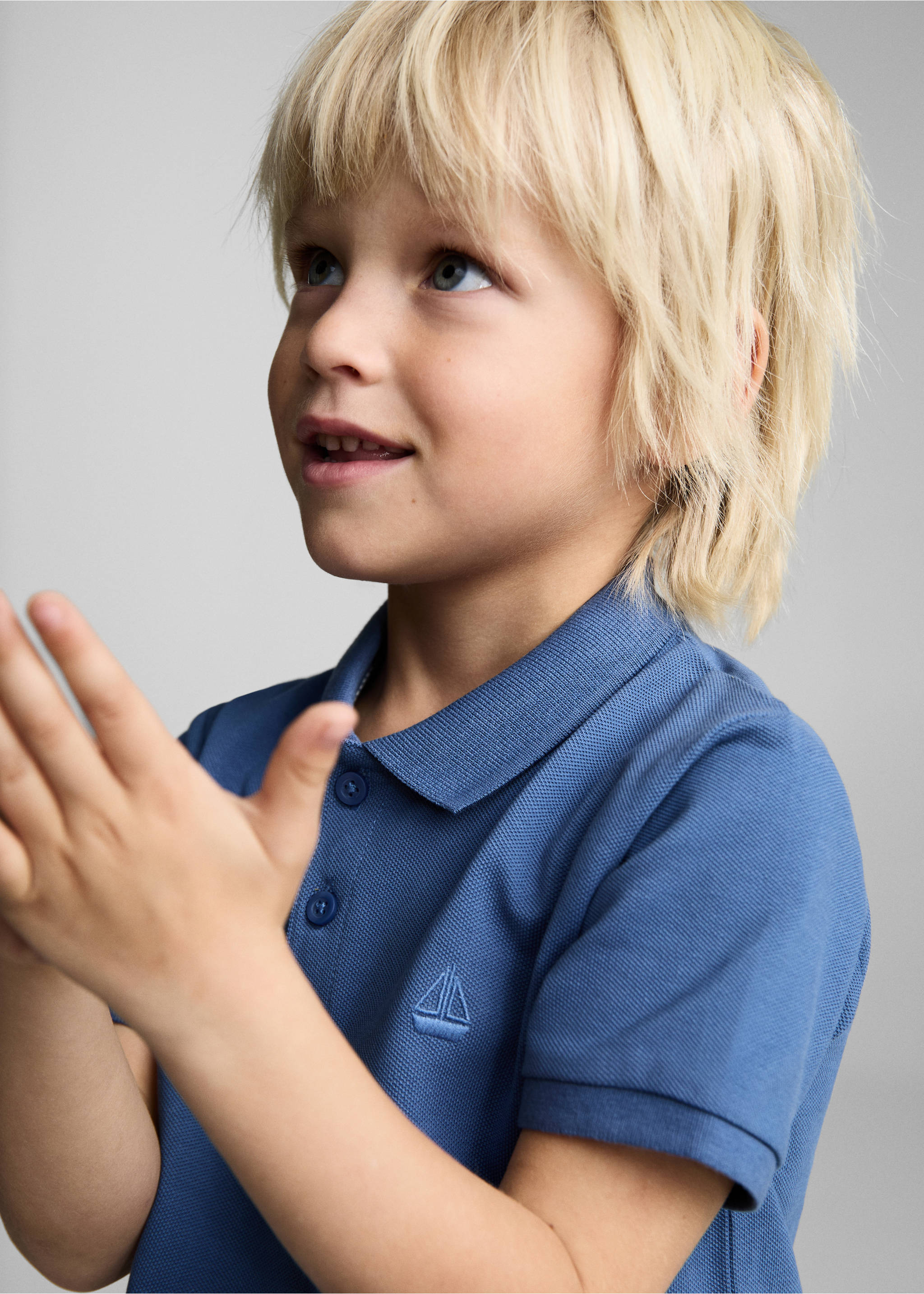 Short-sleeve knitted polo shirt - Details of the article 1, Blue. Ref: 87084390-00.