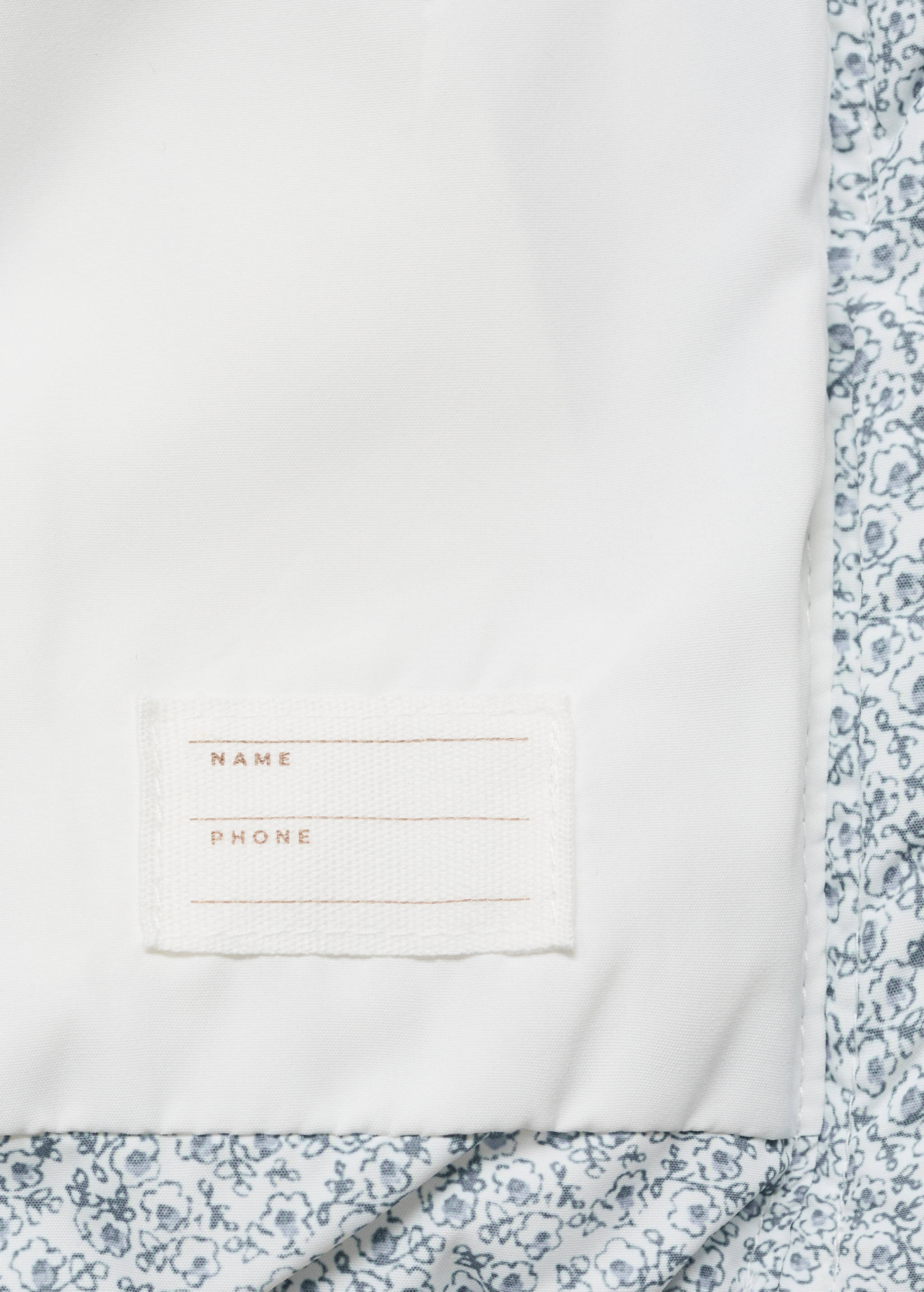 Printed quilted vest - Details of the article 0