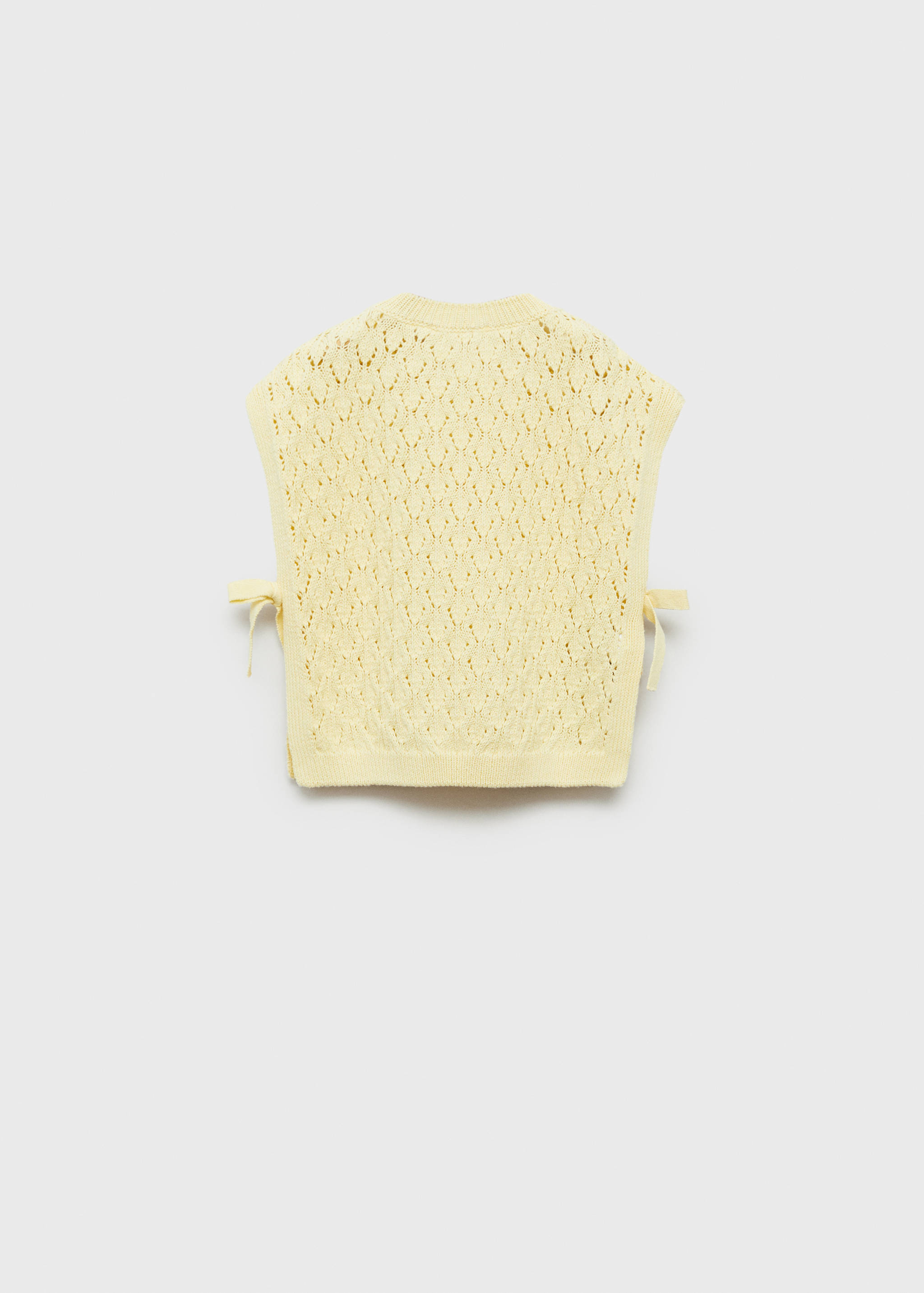 Knitted vest with lace details - Reverse of the article
