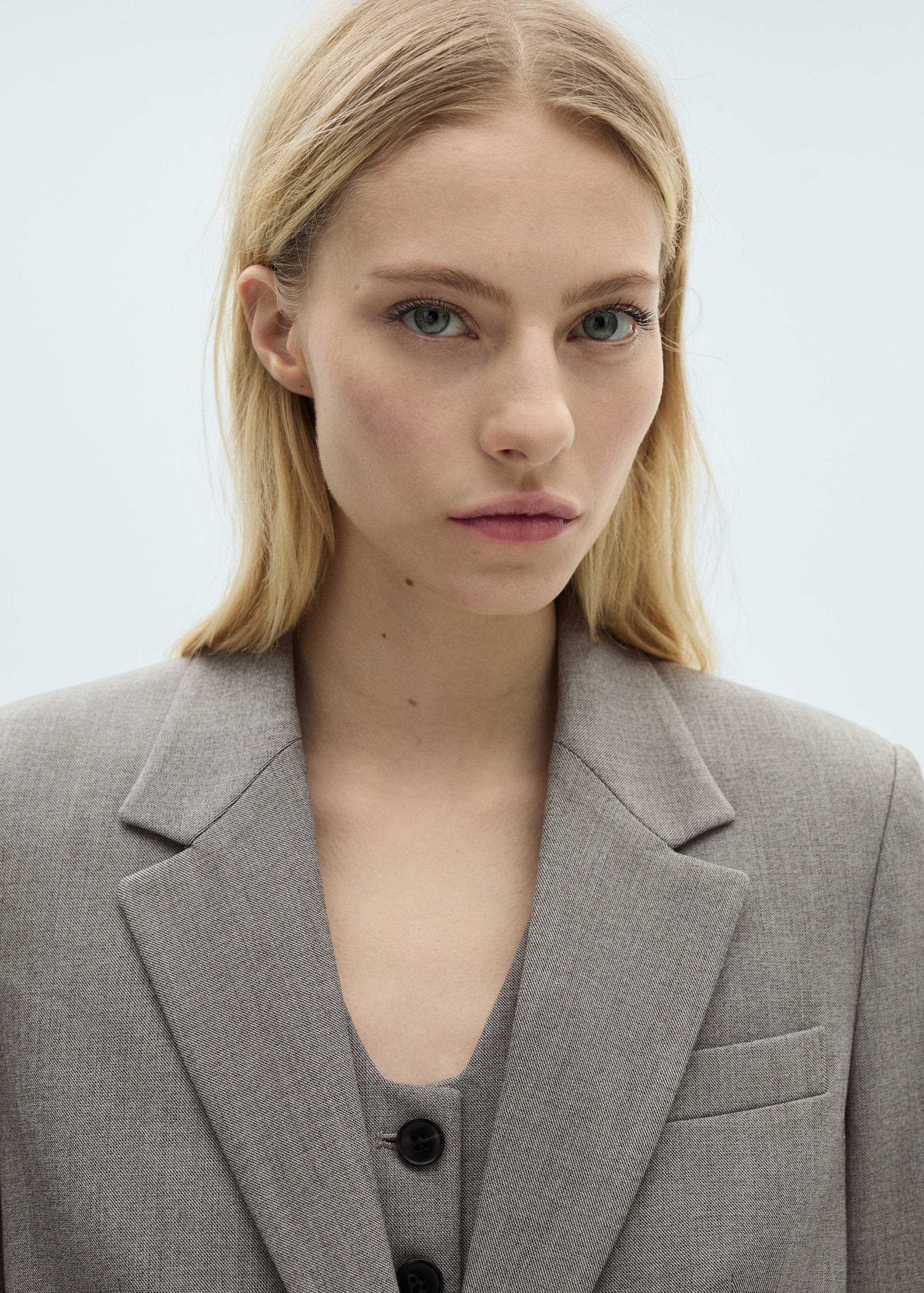 Rovný blejzr s kapsami s patkou - Detail zboží 1