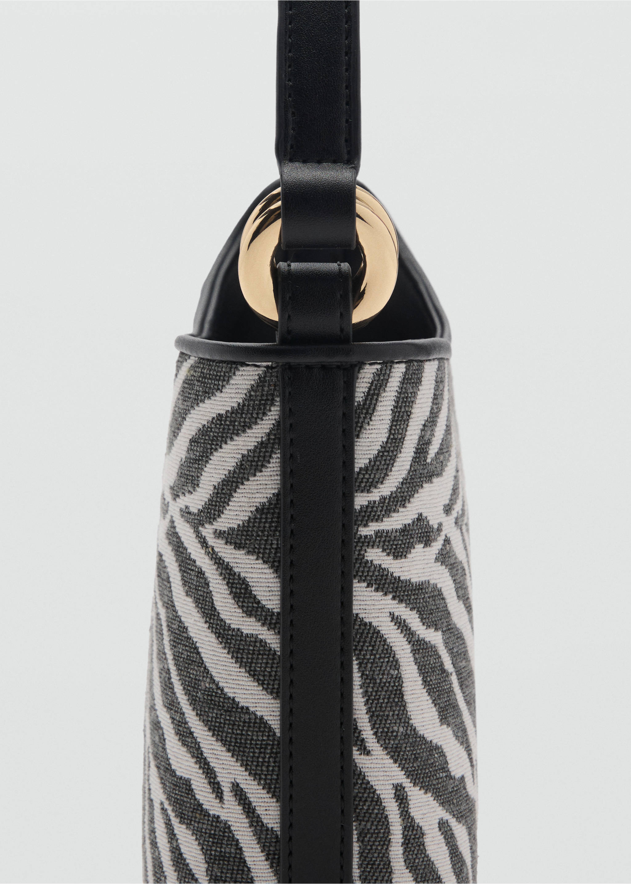 Zebra-print bucket bag - Details of the article 1, Black. Ref: 87085733-00.