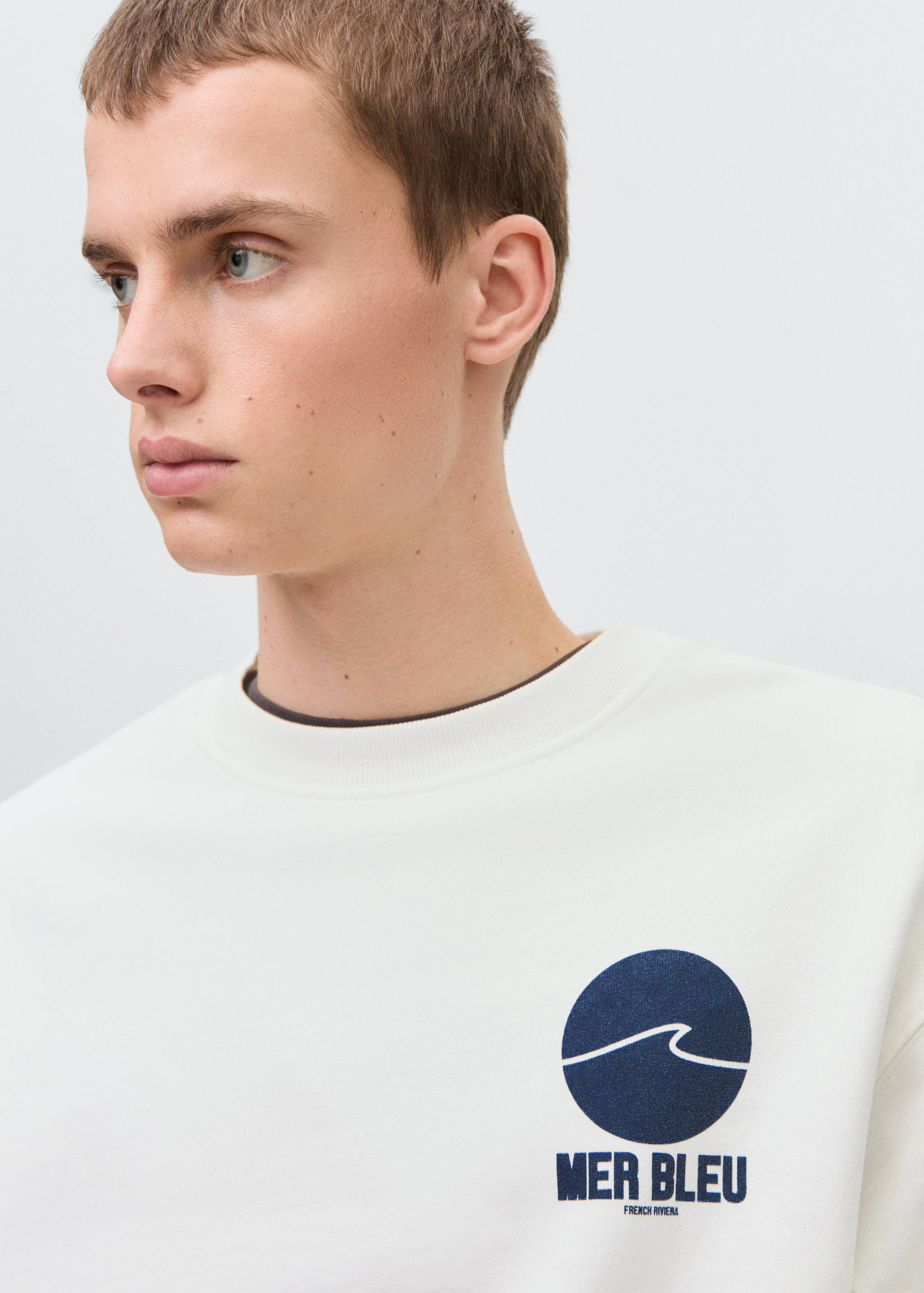 Dessuadora cotó missatge - Detall de l'article 1