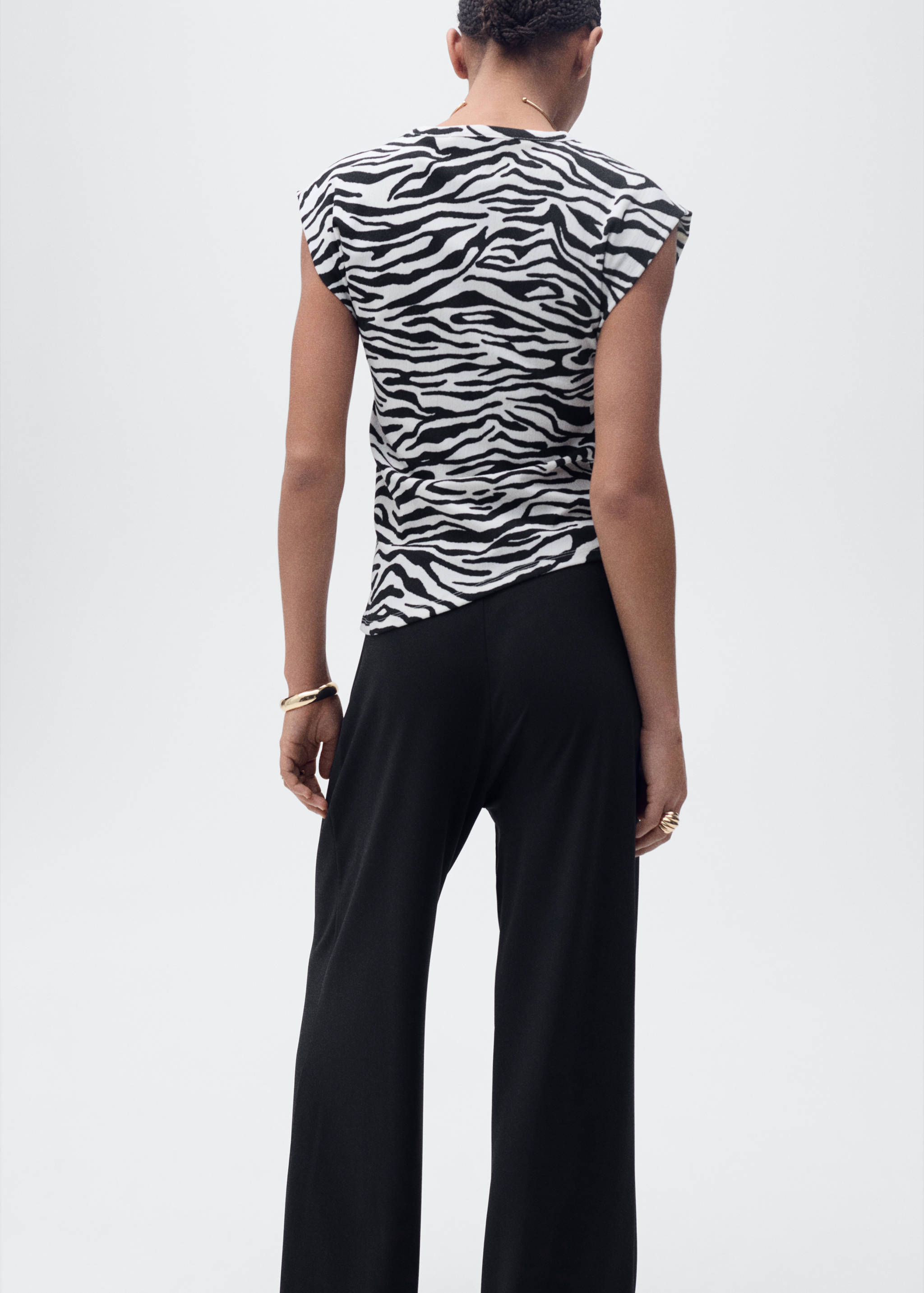 Camiseta drapeada sin mangas - Reverso del artículo