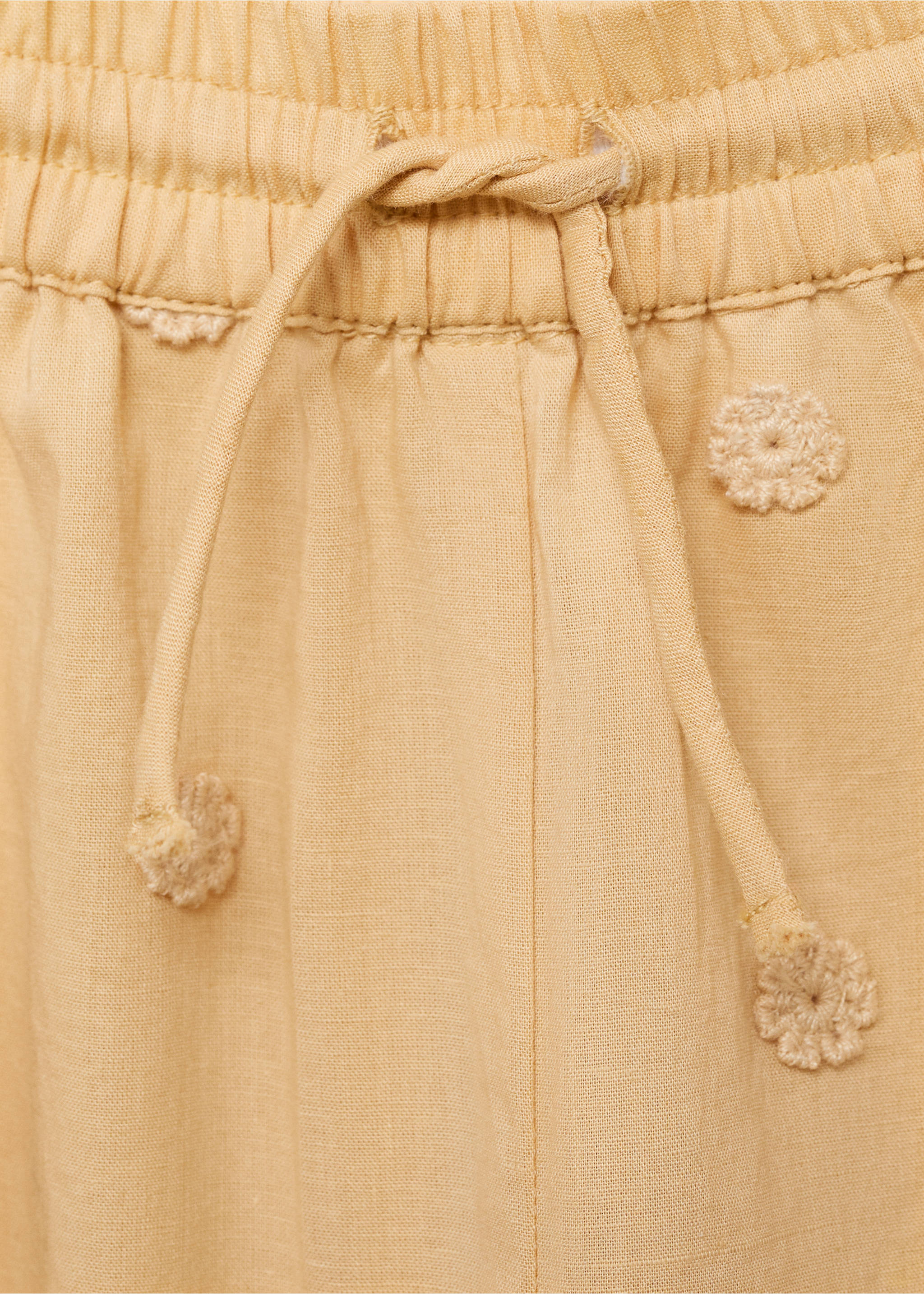 Lange Hose mit Stickdetails - Detail des Artikels 8, Senfgelb. Ref: 87085949-00.