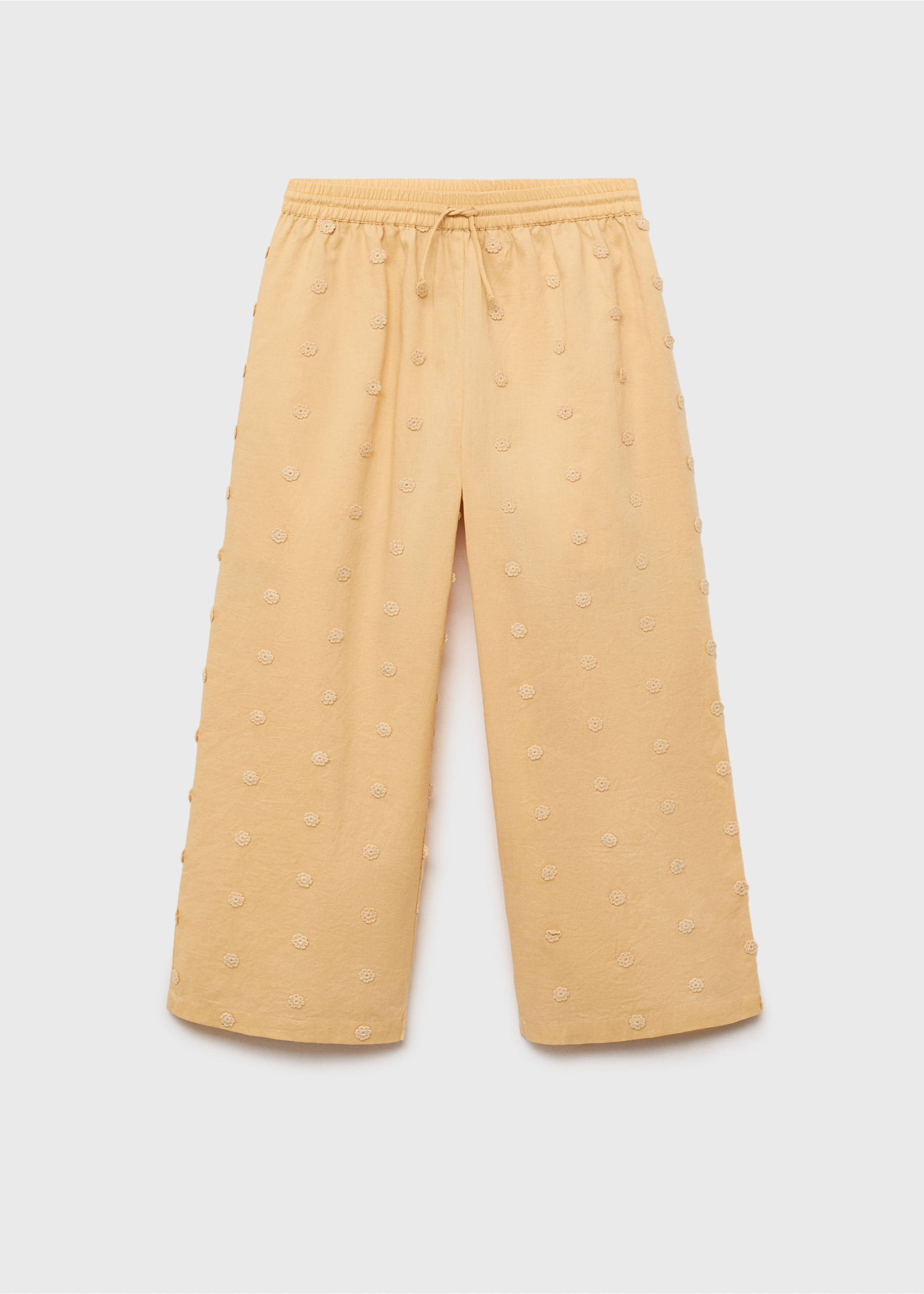 Long trousers with embroidered details - Article without model, Mustard. Ref: 87085949-00.