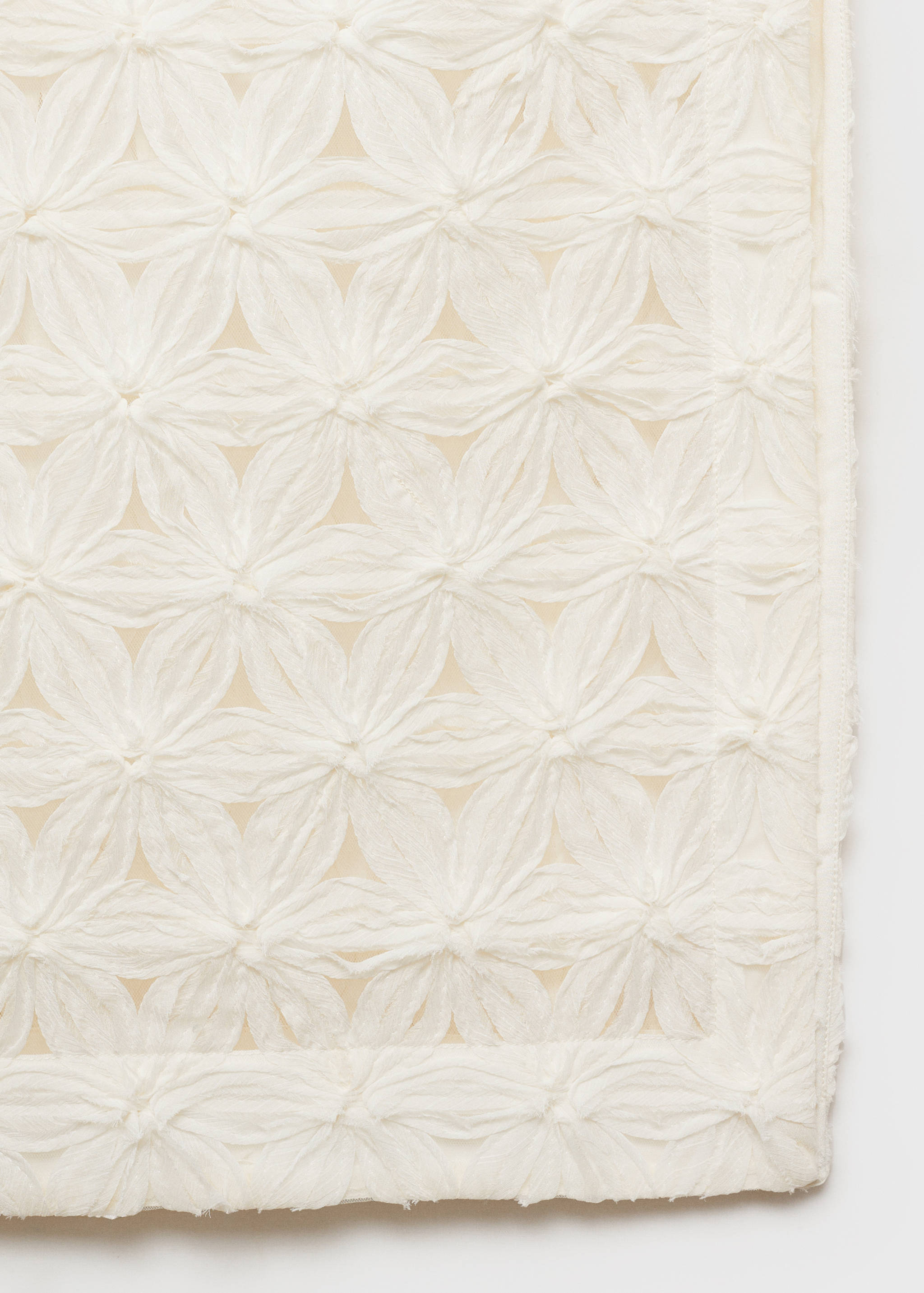 Opengewerkte getextureerde bloemetjesrok - Detail van het artikel 8