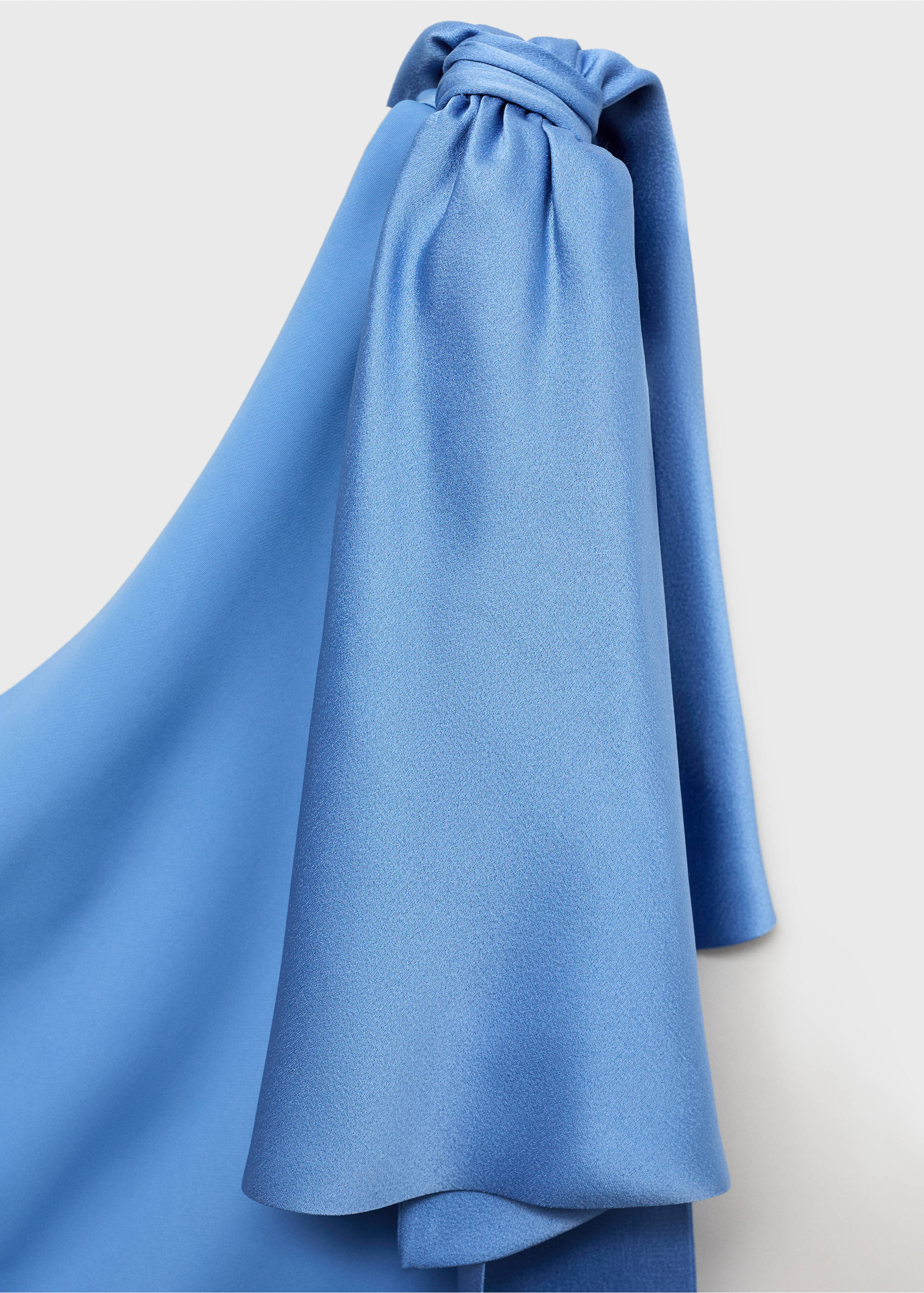 Blue dress detail showing a gathered shoulder knot and draped fabric., Sky Blue. Ref: 87085991-00.