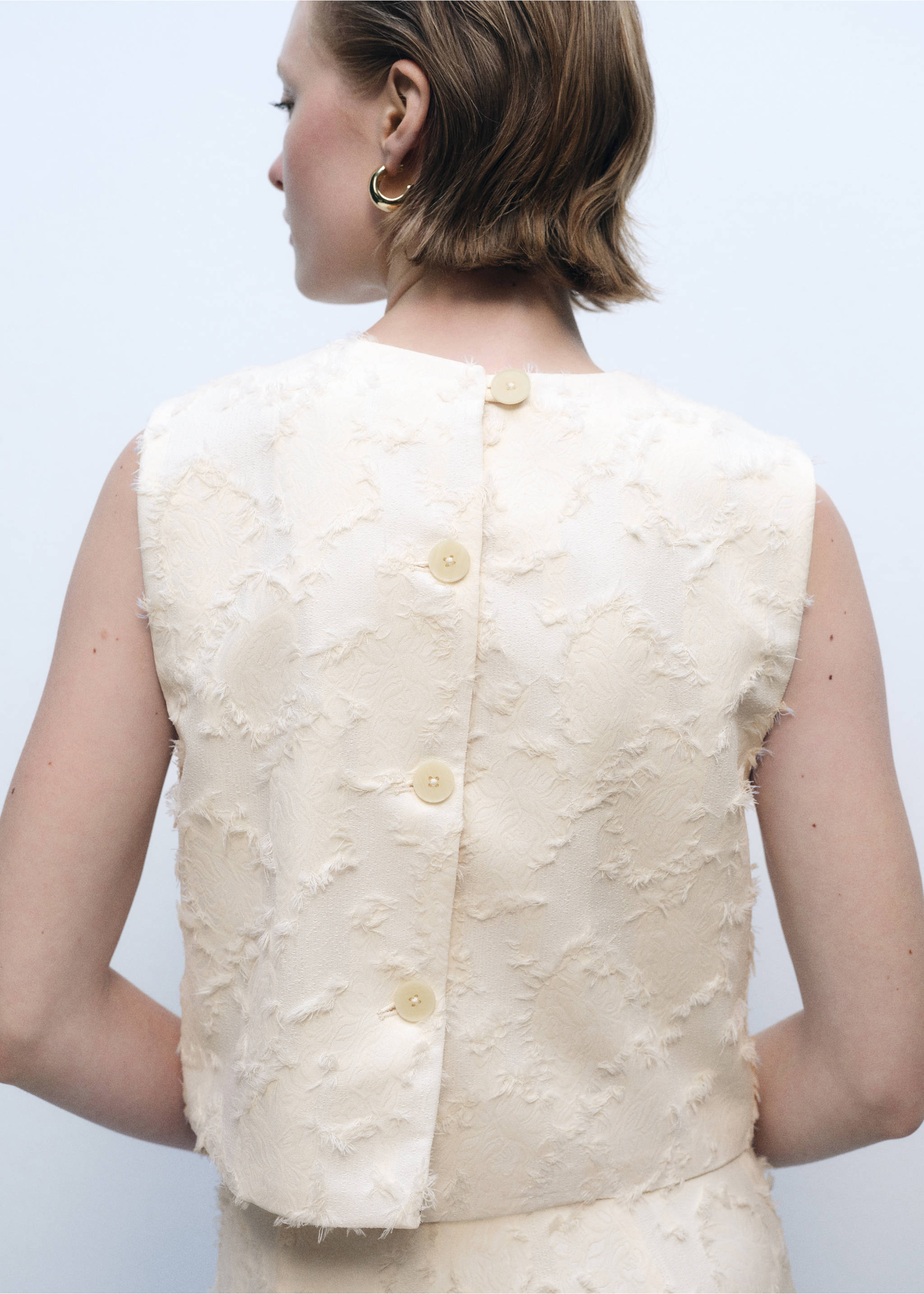 Bauchfreies Top mit Struktur - Rückseite des Artikels, Cremeweiß. Ref: 87086368-00.