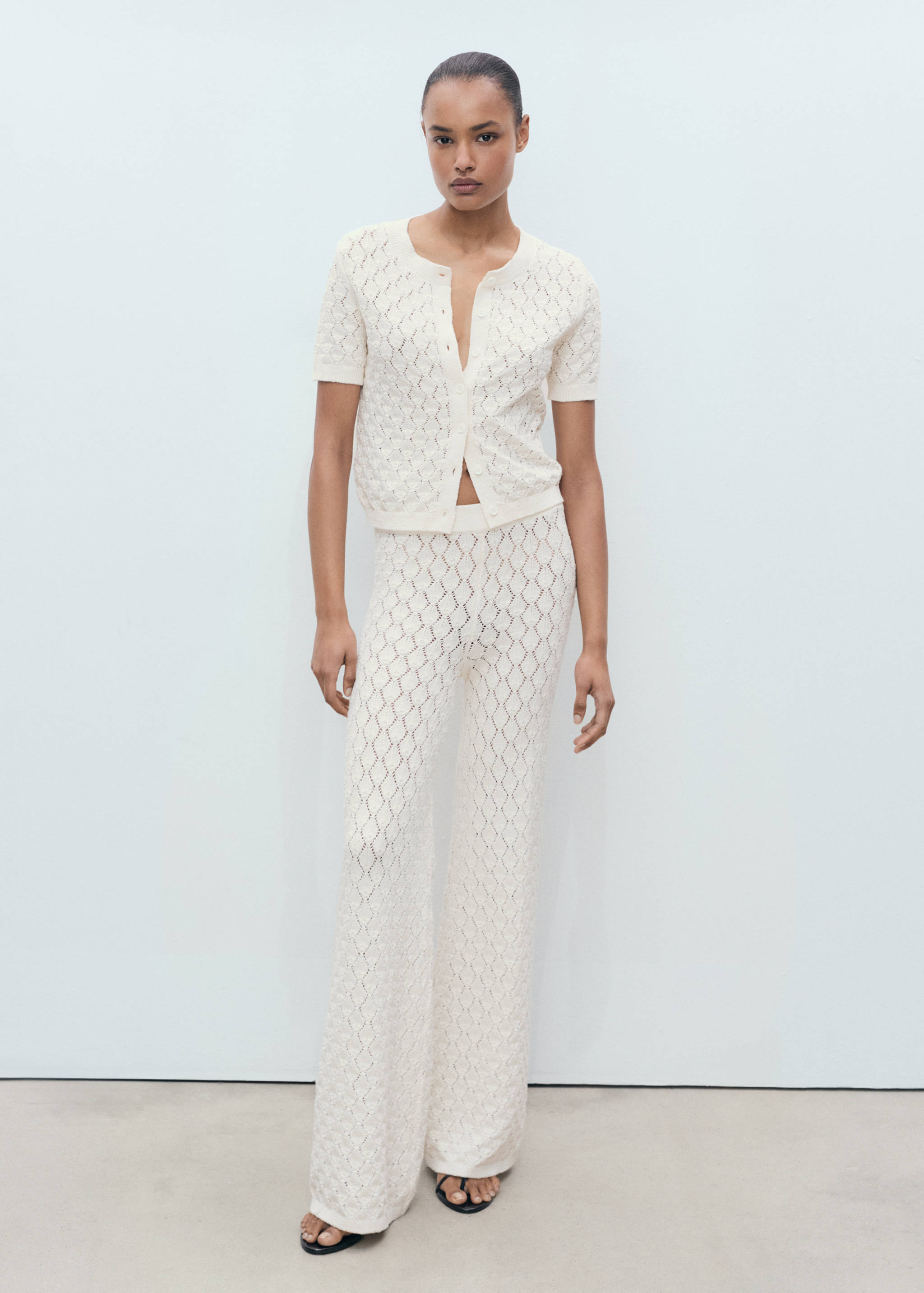 Short-sleeved knitted cardigan with lace design - General plane