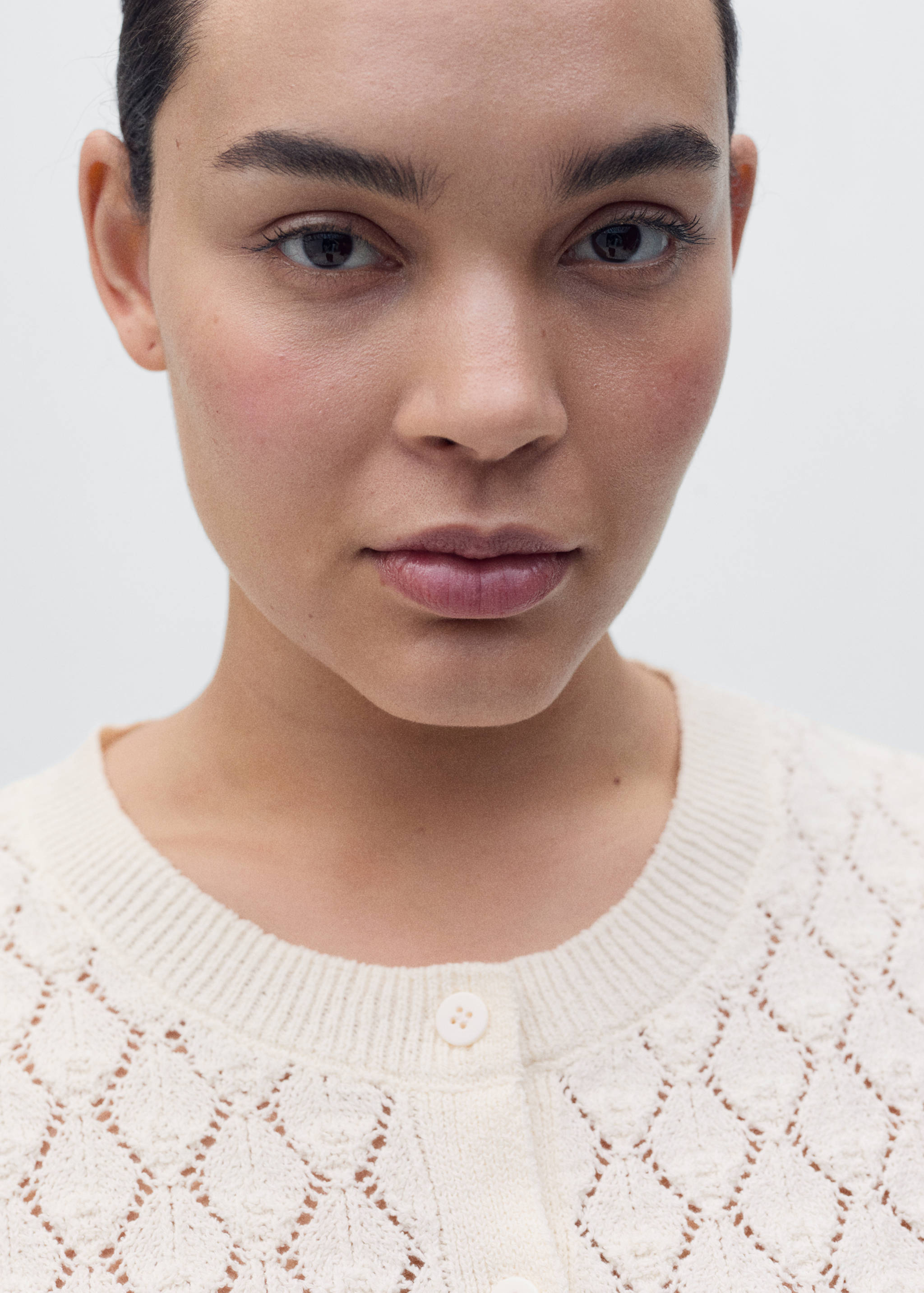 Short-sleeved knitted cardigan with lace design - Details of the article 4