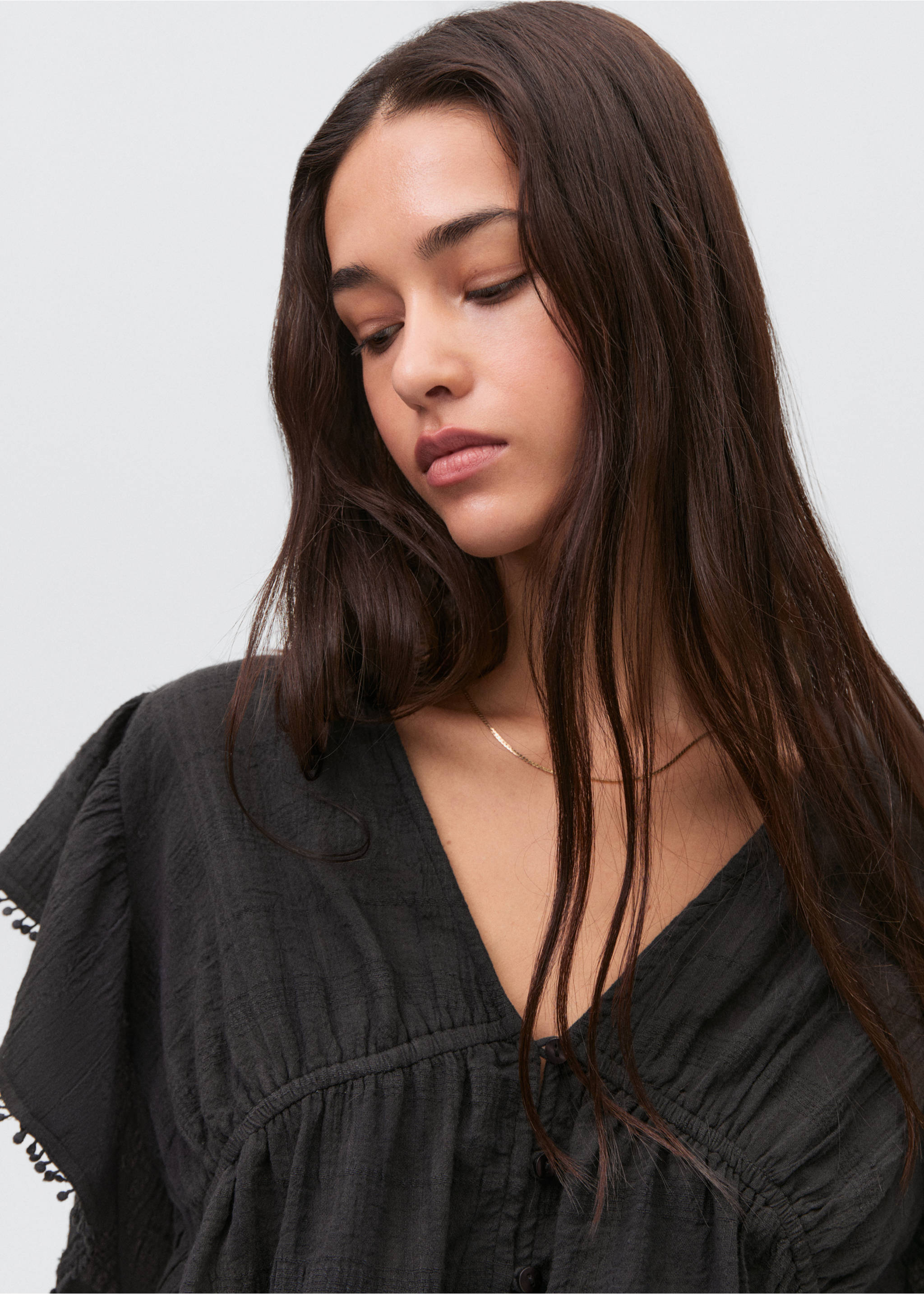 Crop-Bluse mit Rüschen - Detail des Artikels 1, Schwarz. Ref: 87087681-00.