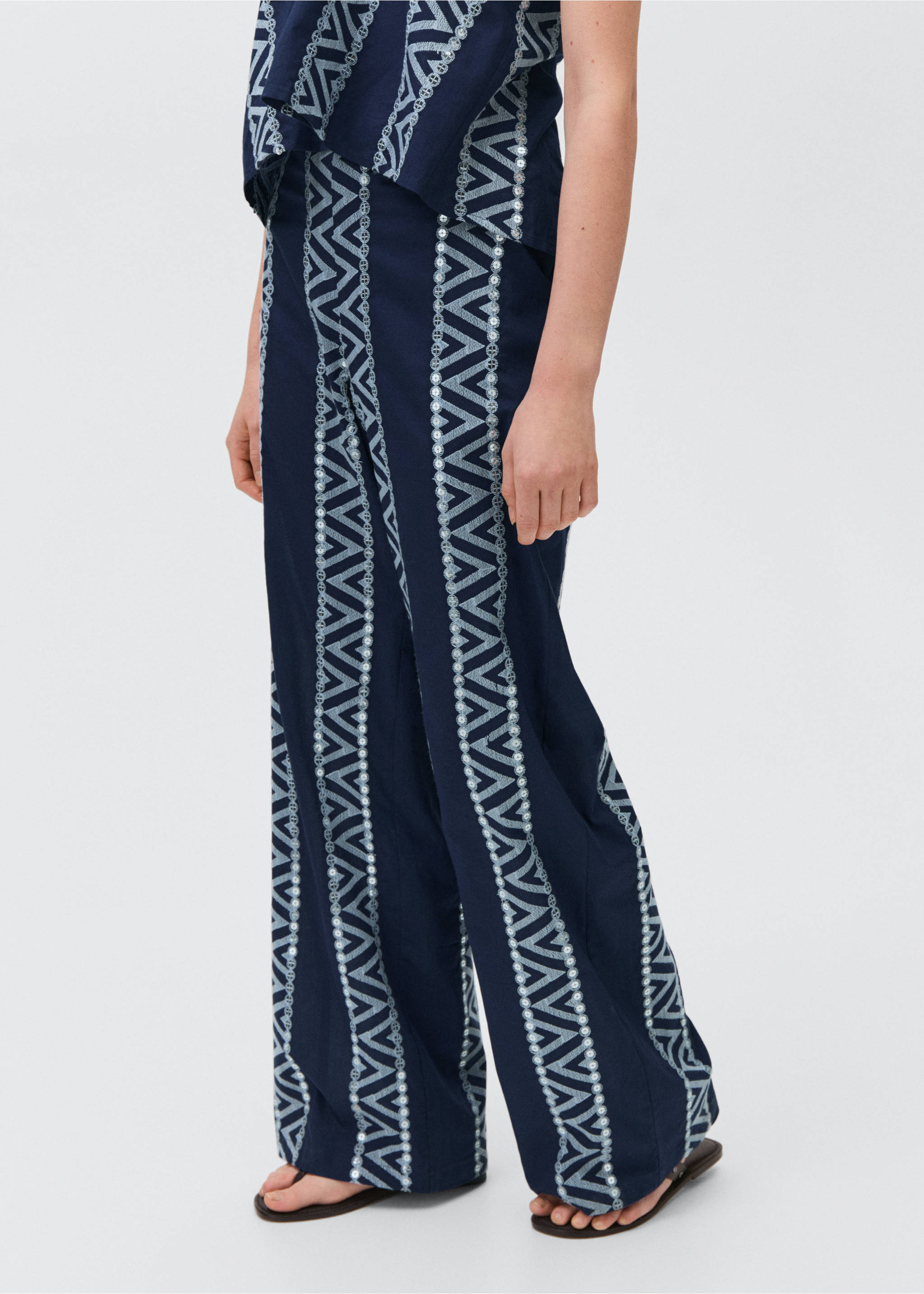 Embroidered straight-fit trousers - Details of the article 1, Navy. Ref: 87088269-00.