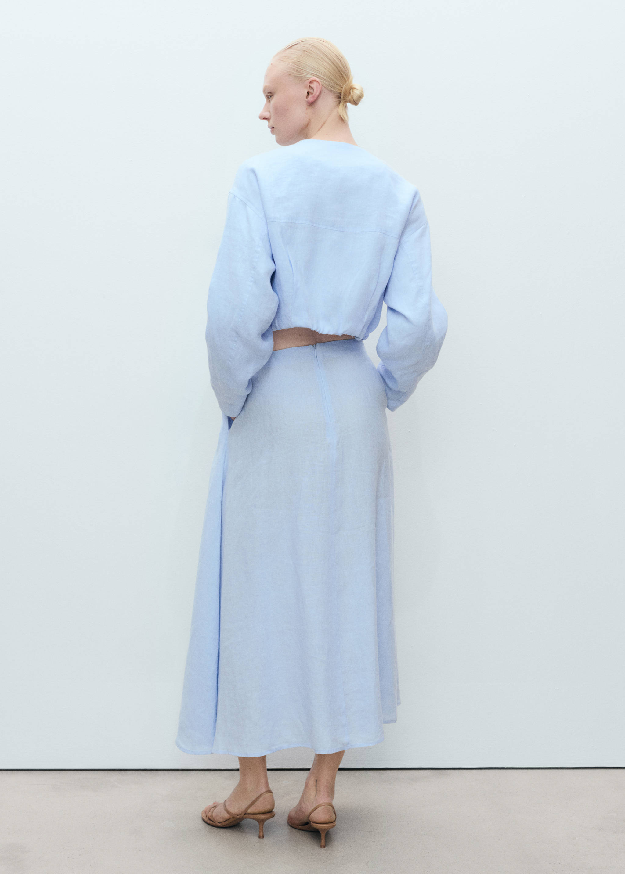 Faldilla lli detall plecs - Revers de l'article