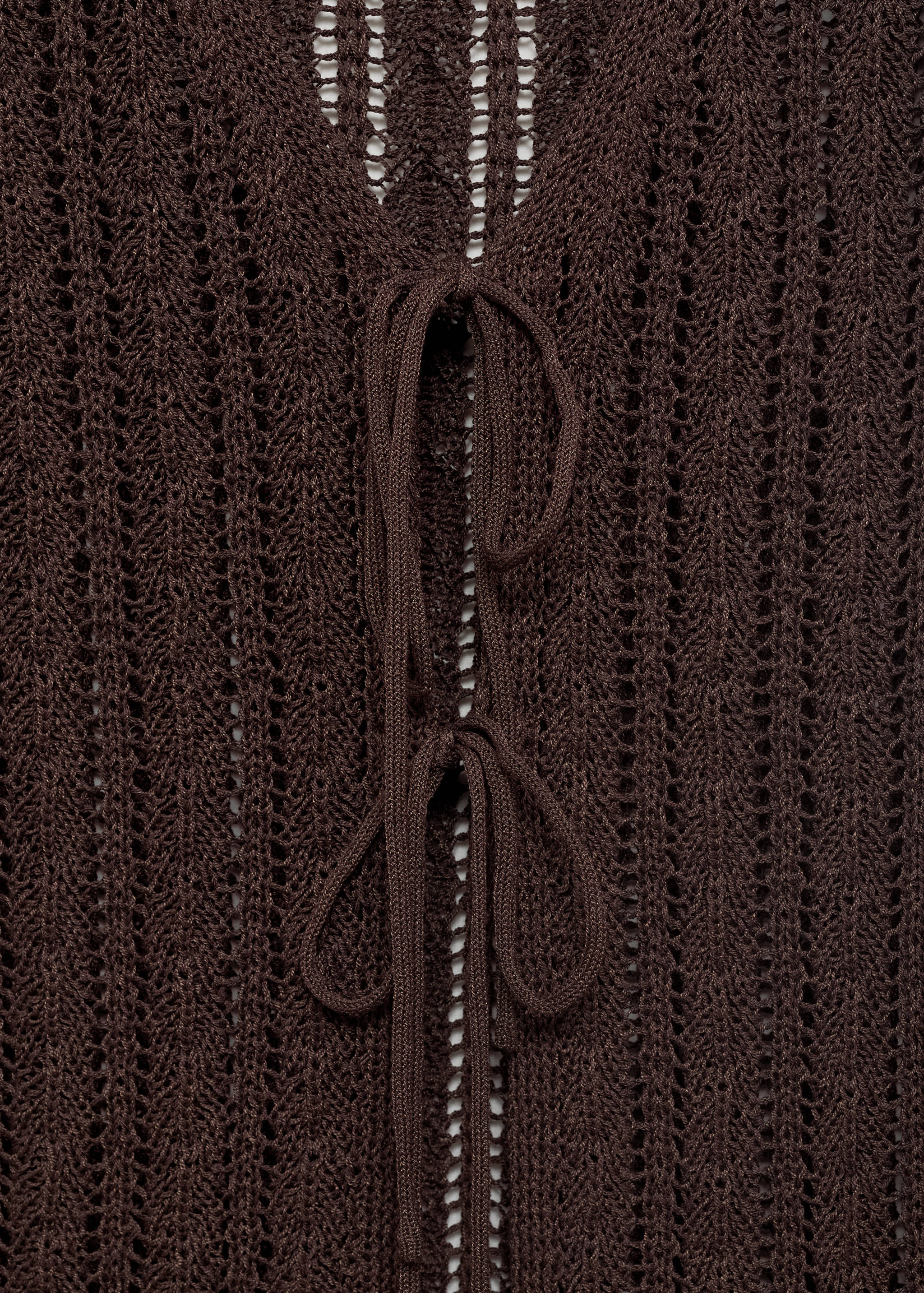 Openwork knitted waistcoat with bow closure - Details of the article 8