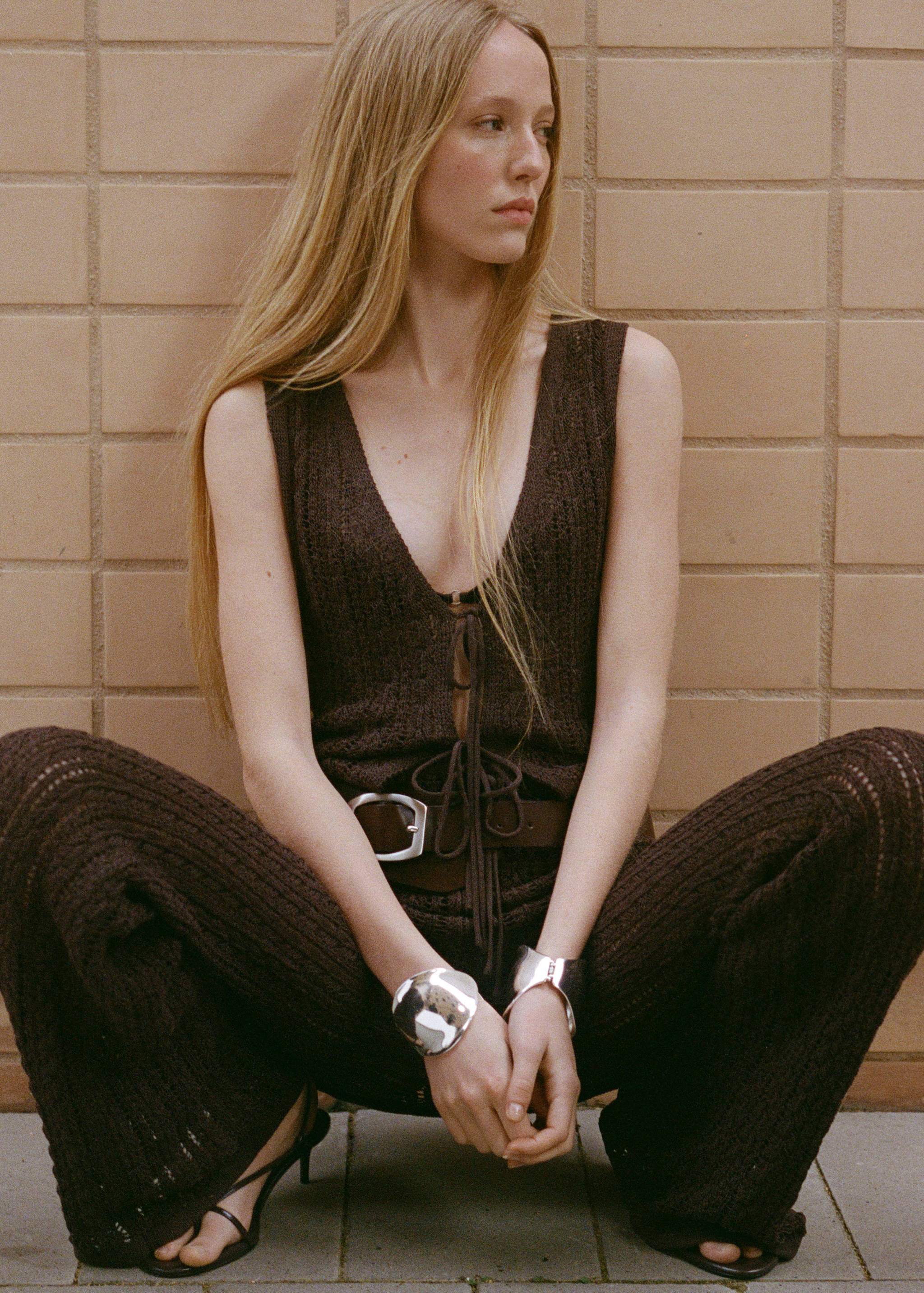 Openwork knitted waistcoat with bow closure - Details of the article 9