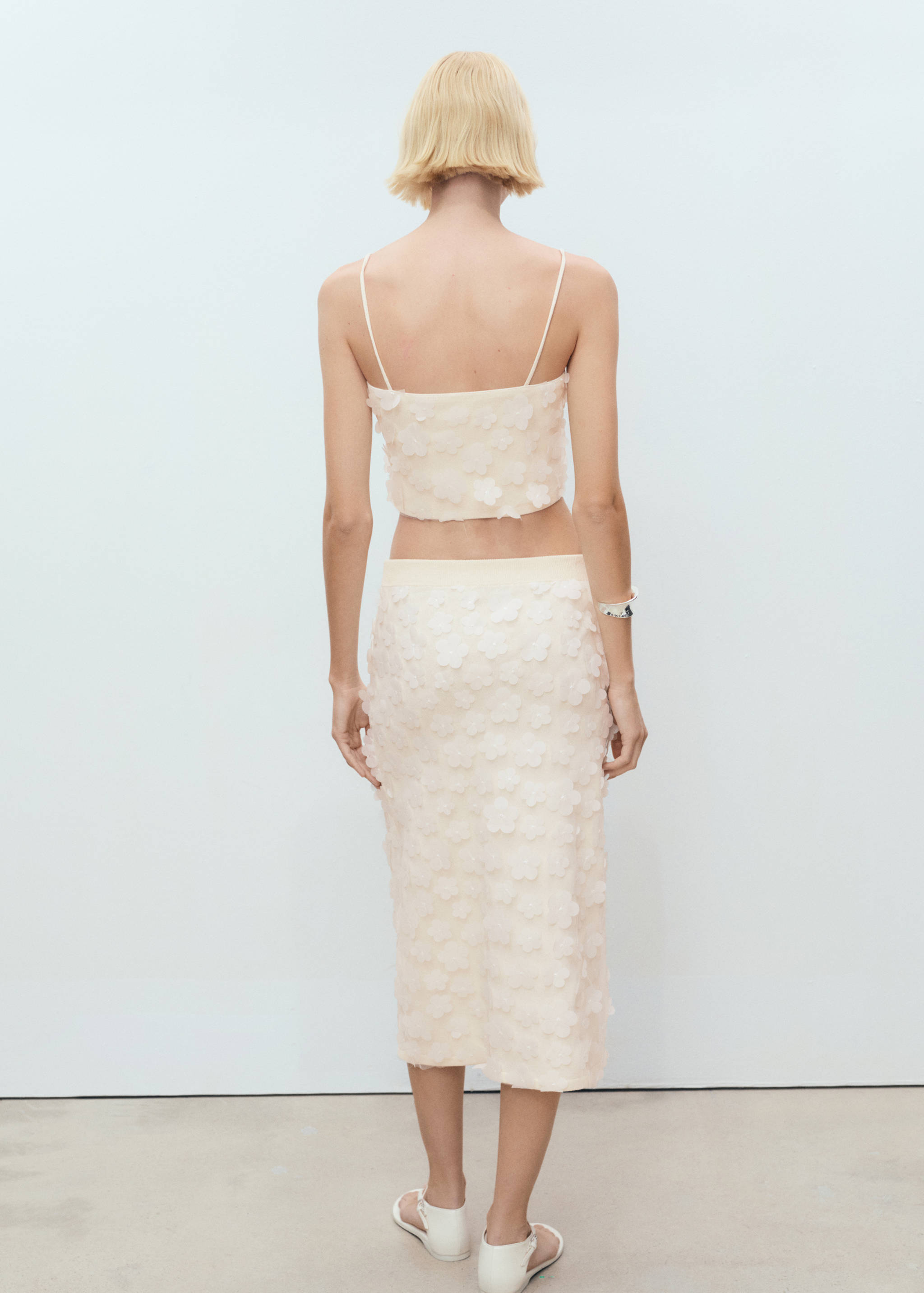 Falda midi flores relieve - Reverso del artículo