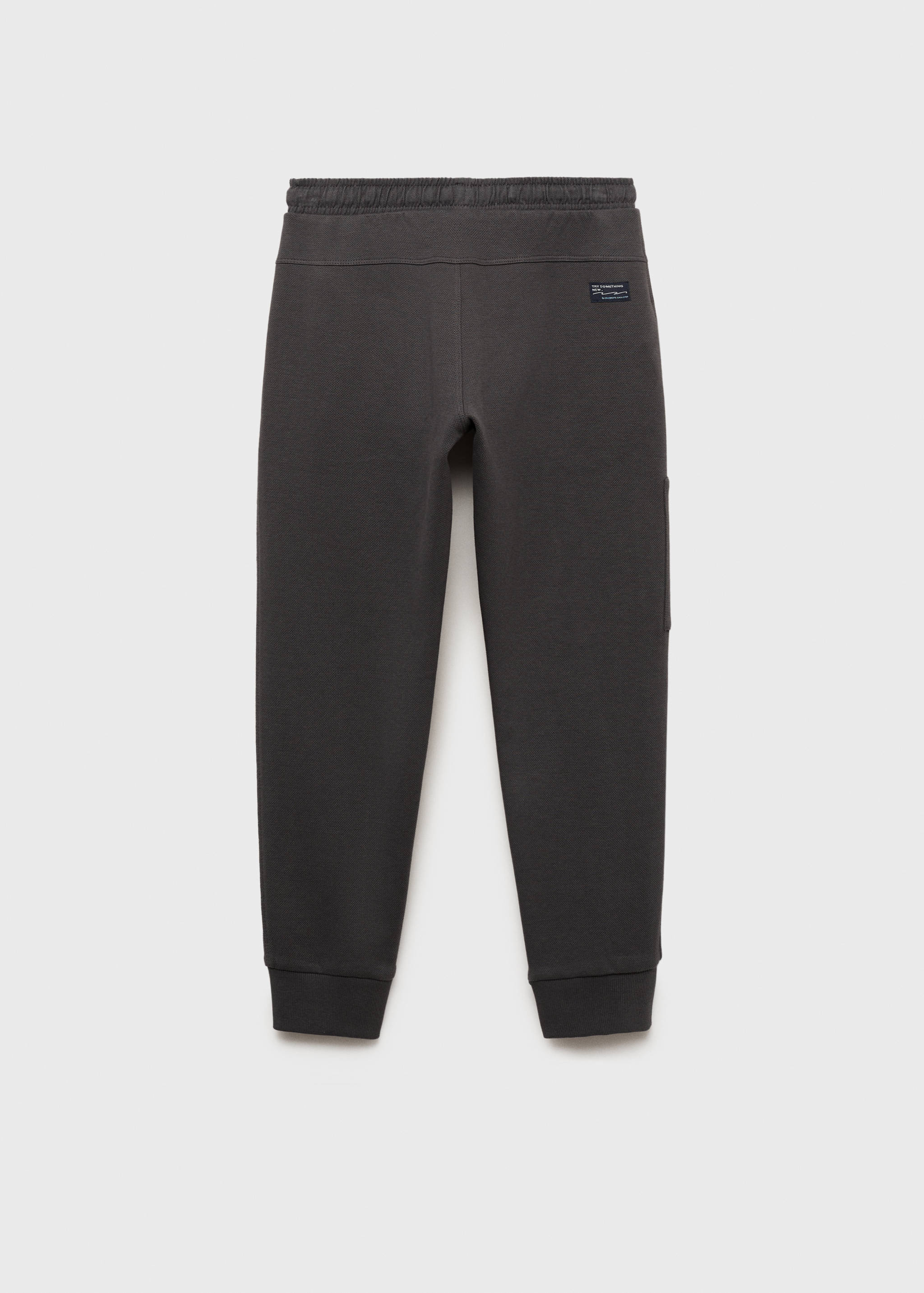 Jogger trousers with elastic waist - Reverse of the article