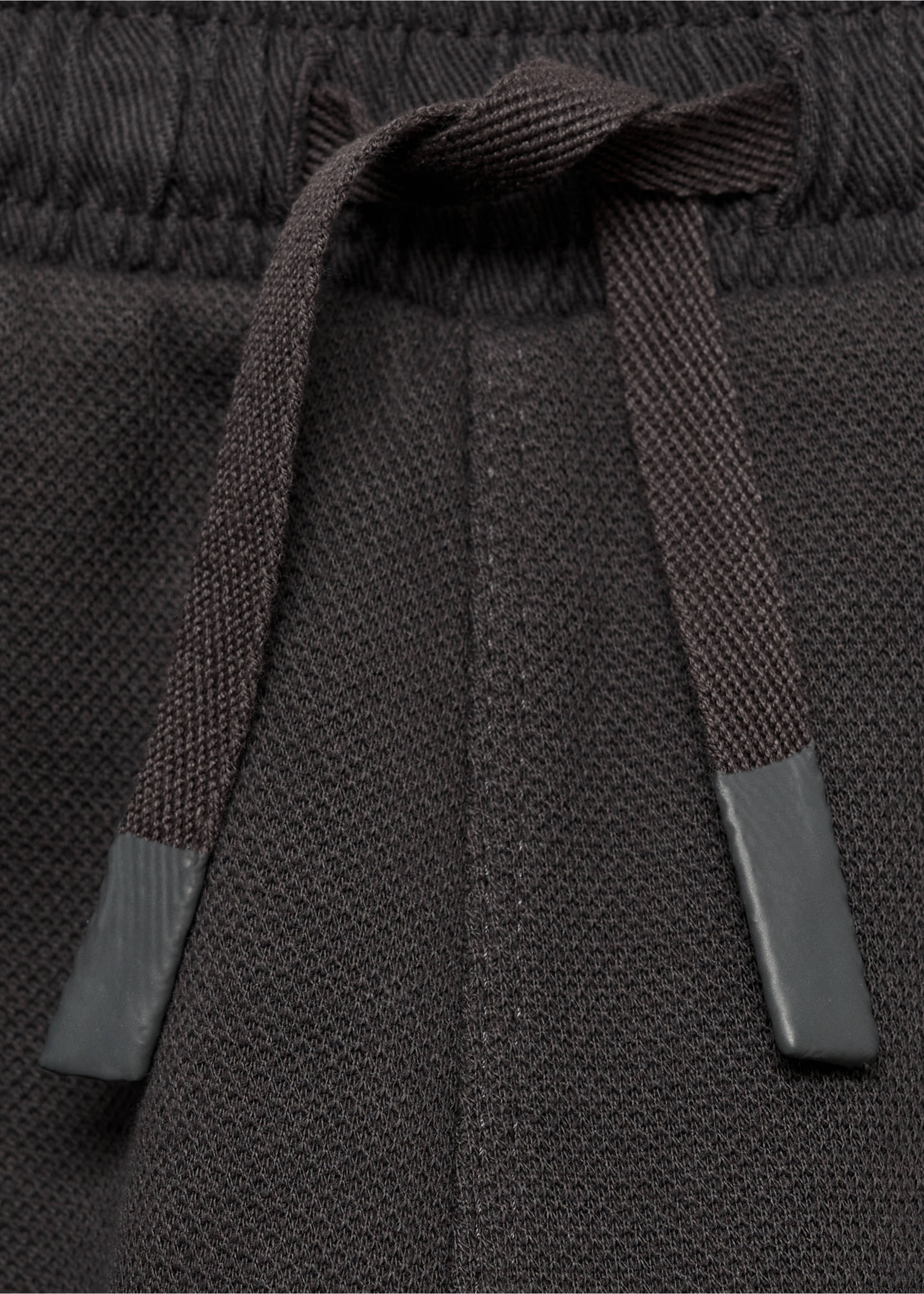 Jogger trousers with elastic waist - Details of the article 8, Charcoal. Ref: 87090433-00.