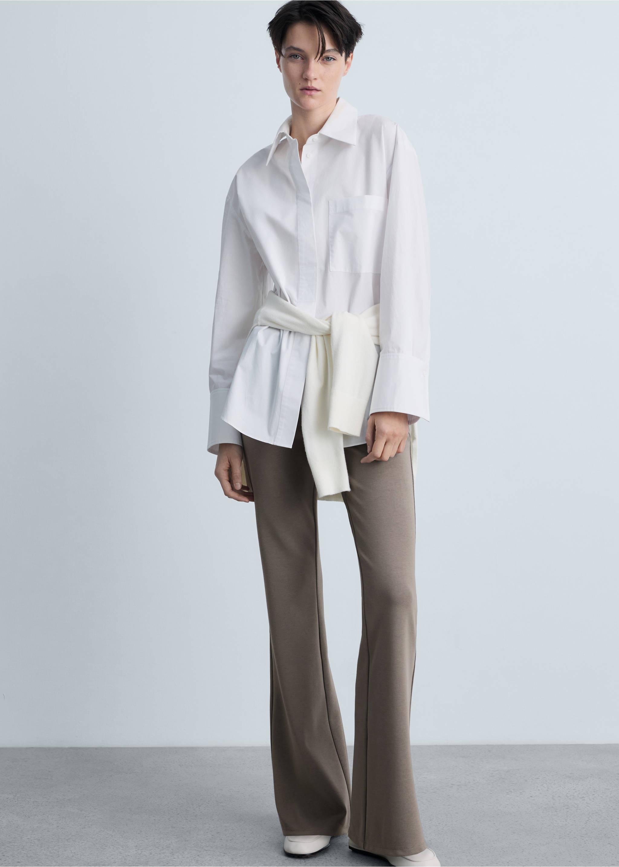 Pantaloni din tricot evazați - Detaliu al articolului 2, Maro mediu. Ref: 87093274-00.