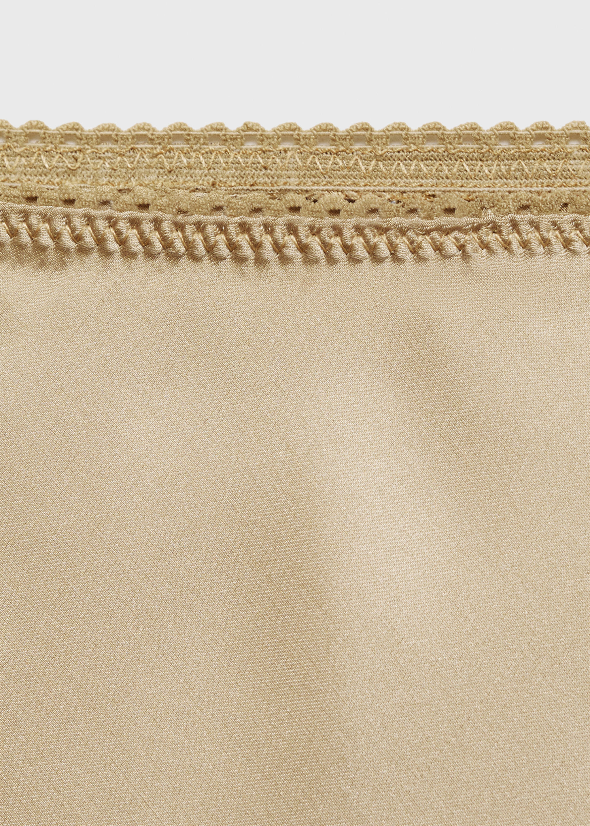 Saia comprida acetinada - Pormenor do artigo 8