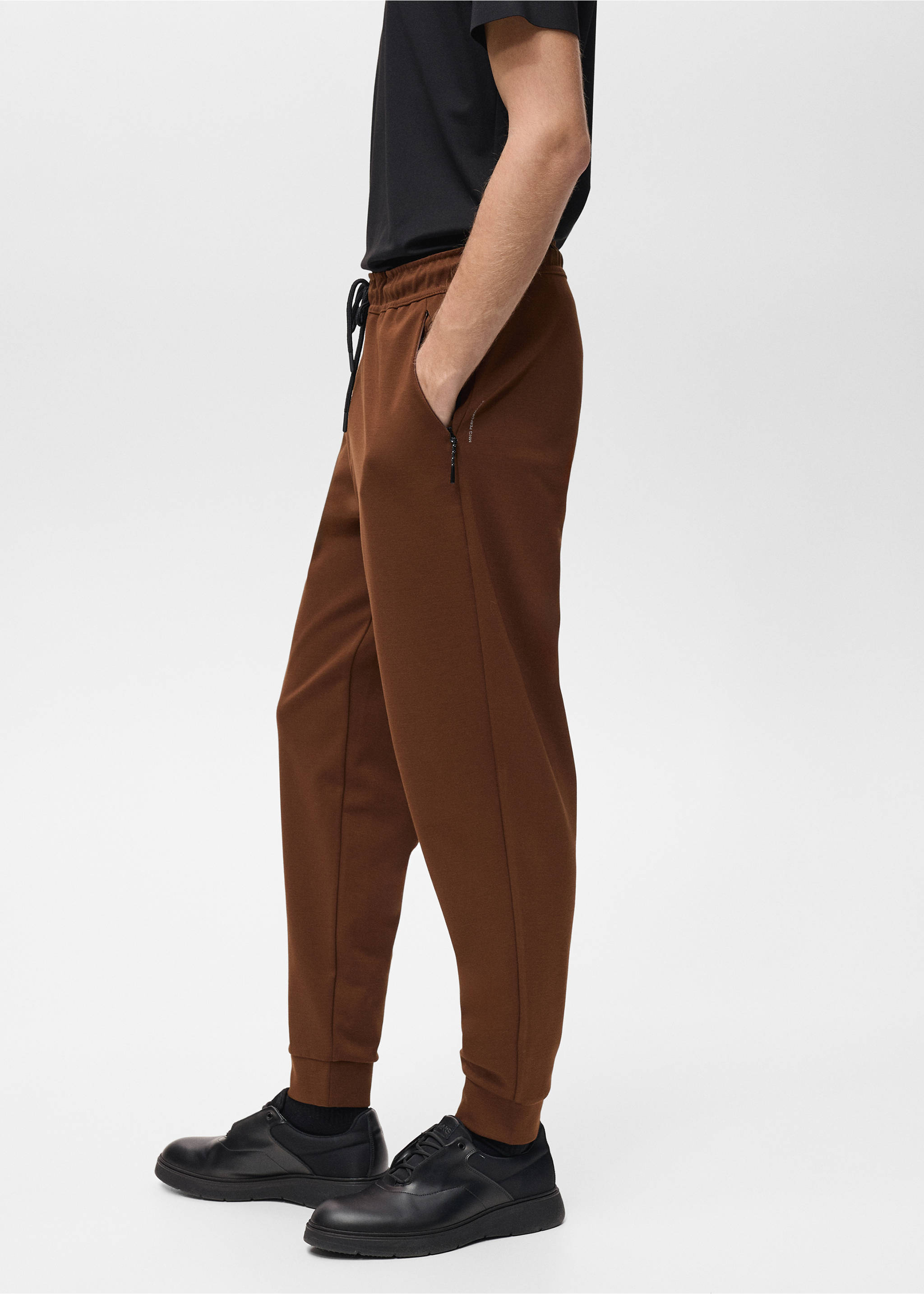 COOLMAX® joggers with elastic waistband - Details of the article 2, Burnt Orange. Ref: 87094405-00.