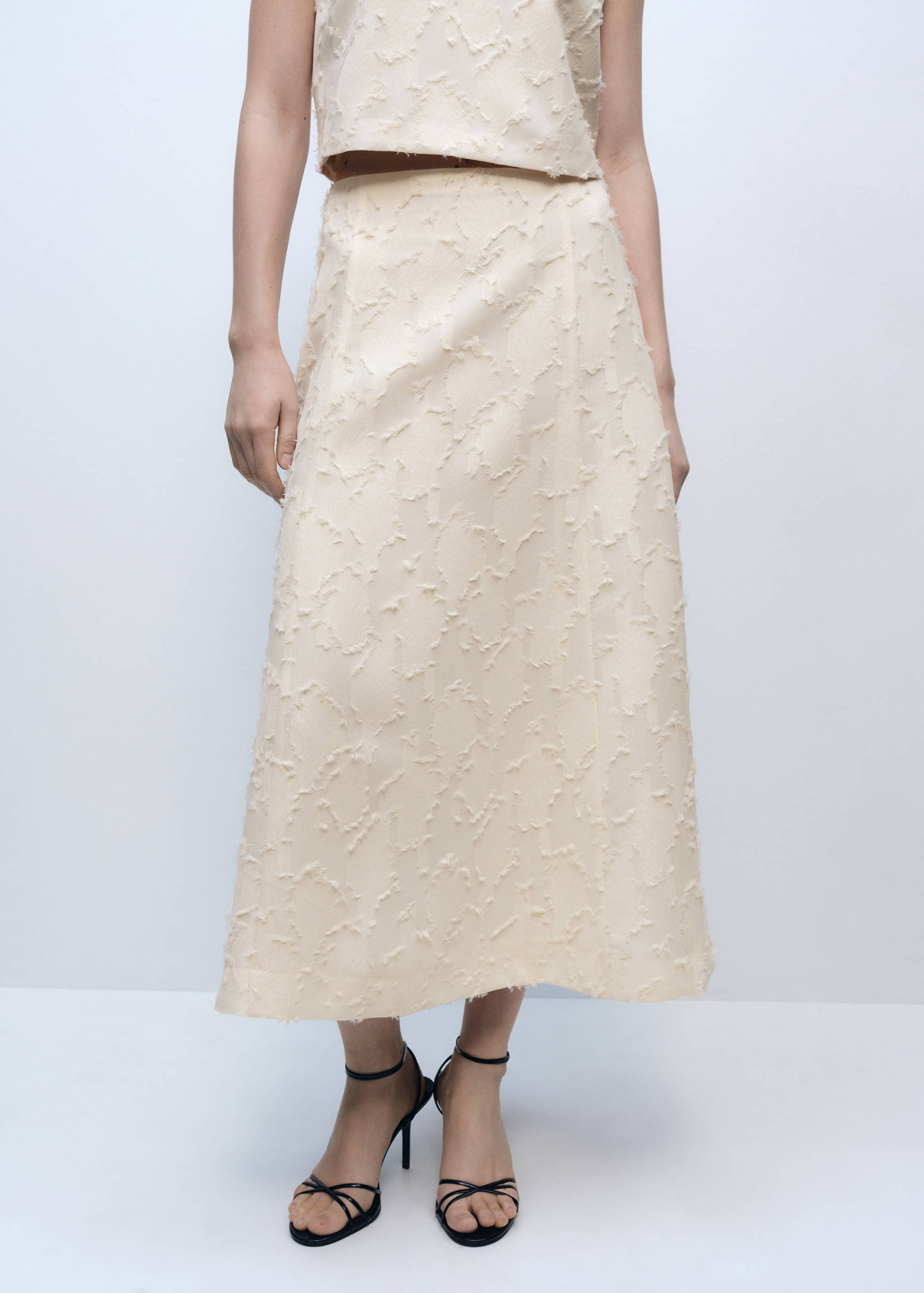 Jupe évasée à texture - Plan moyen