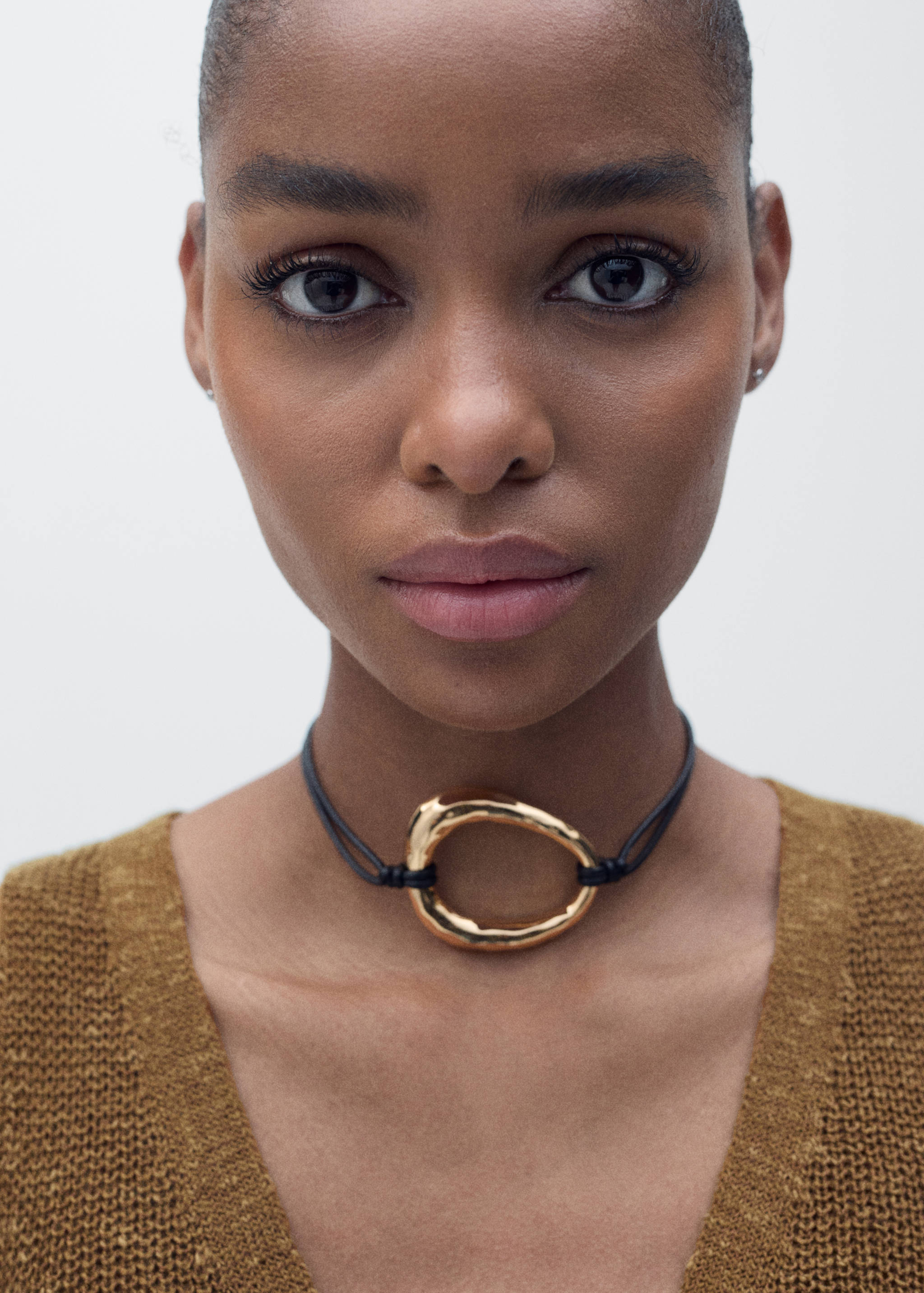 Grofgebreid gilet met knopen - Detail van het artikel 1