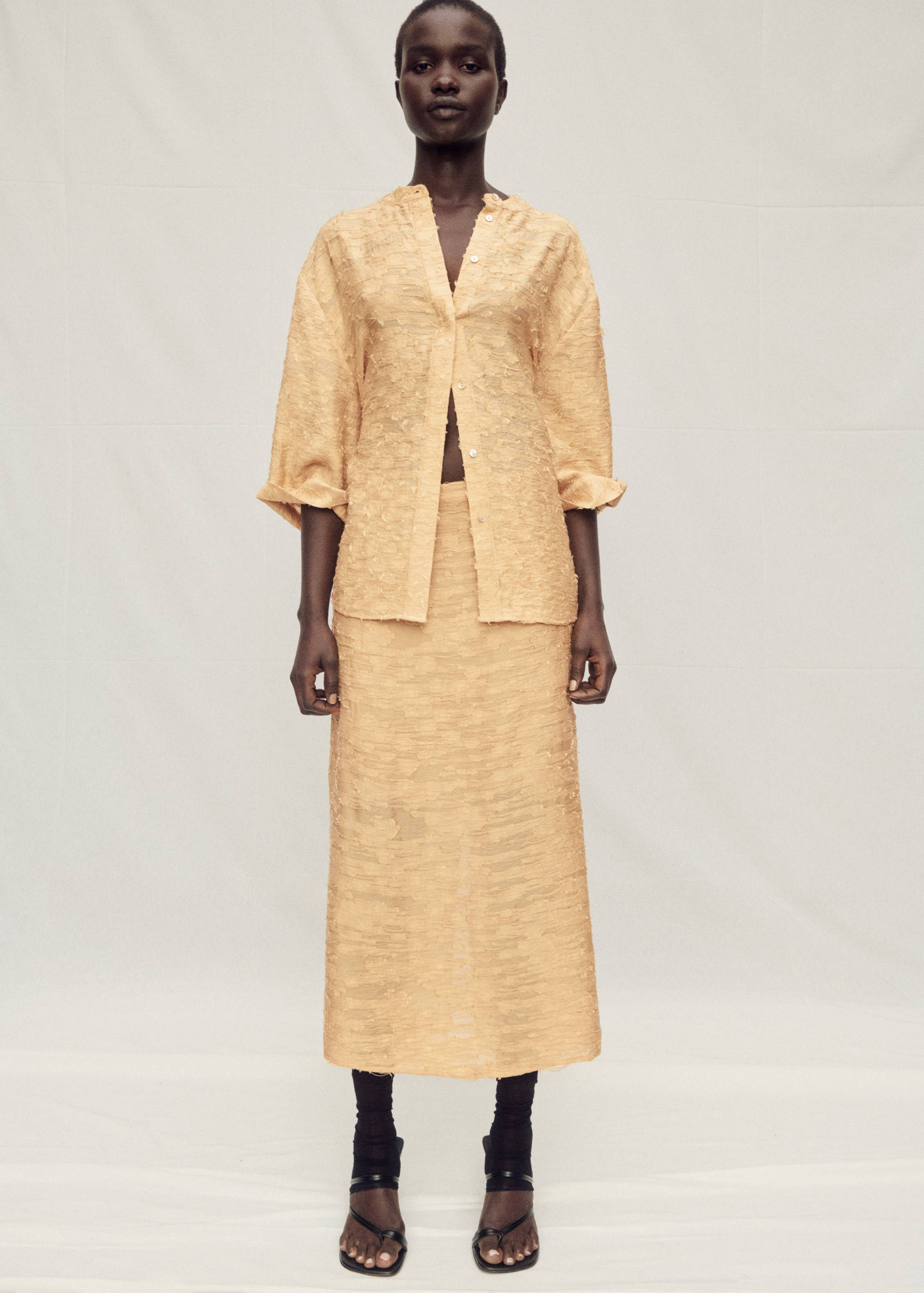 Textured straight skirt - General plane