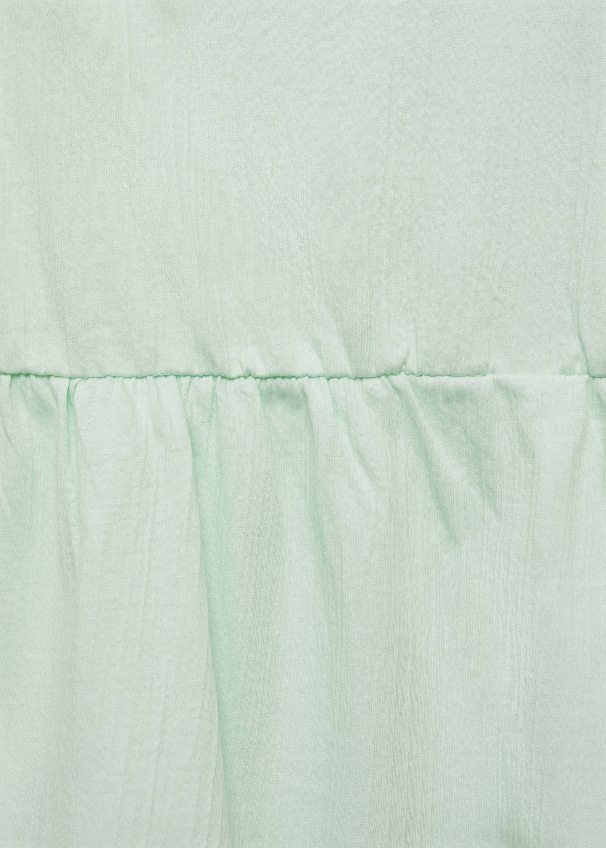 Close-up of light green top fabric with a gathered seam detail., Mint Green. Ref: 87097689-00.