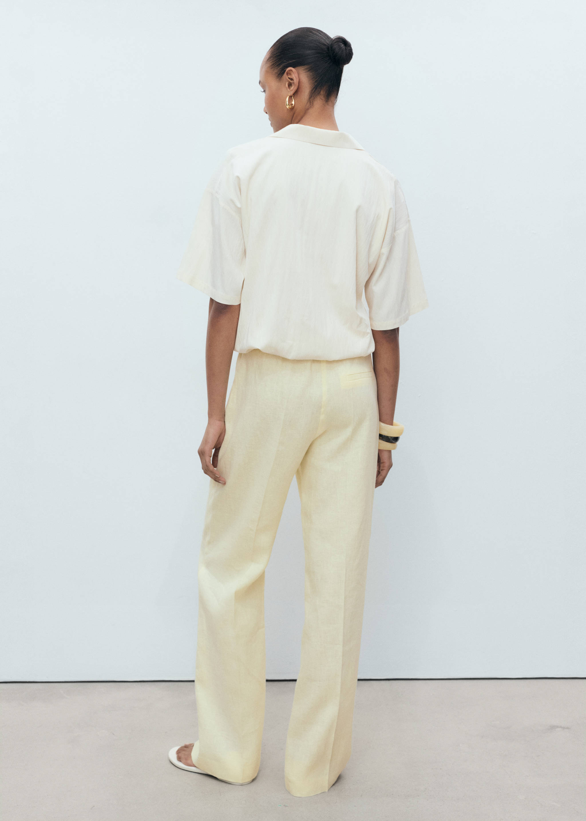 Straight-fit linen trousers with bow - Reverse of the article