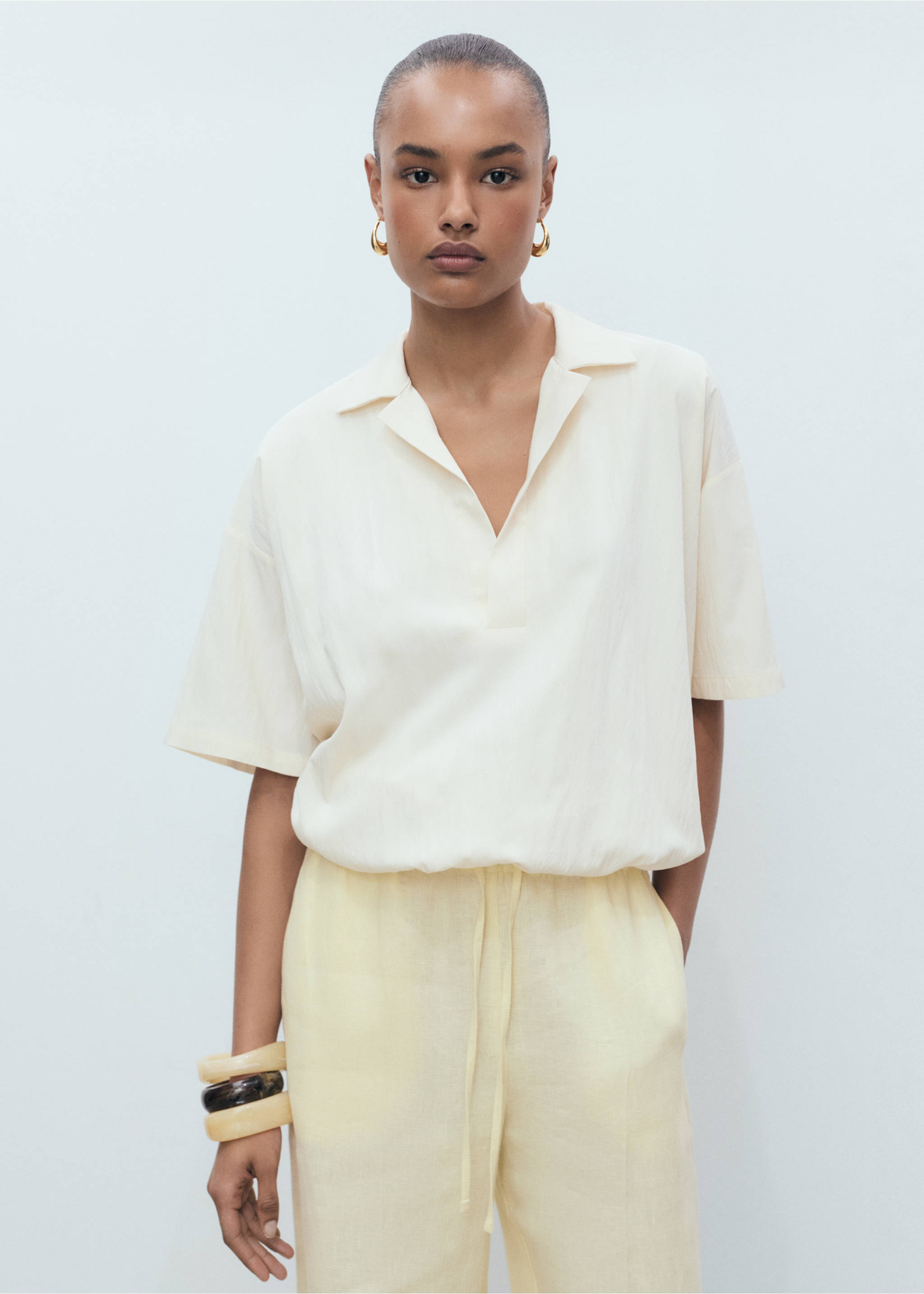 Straight-fit linen trousers with bow - Details of the article 1, Pastel Yellow. Ref: 87097691-00.