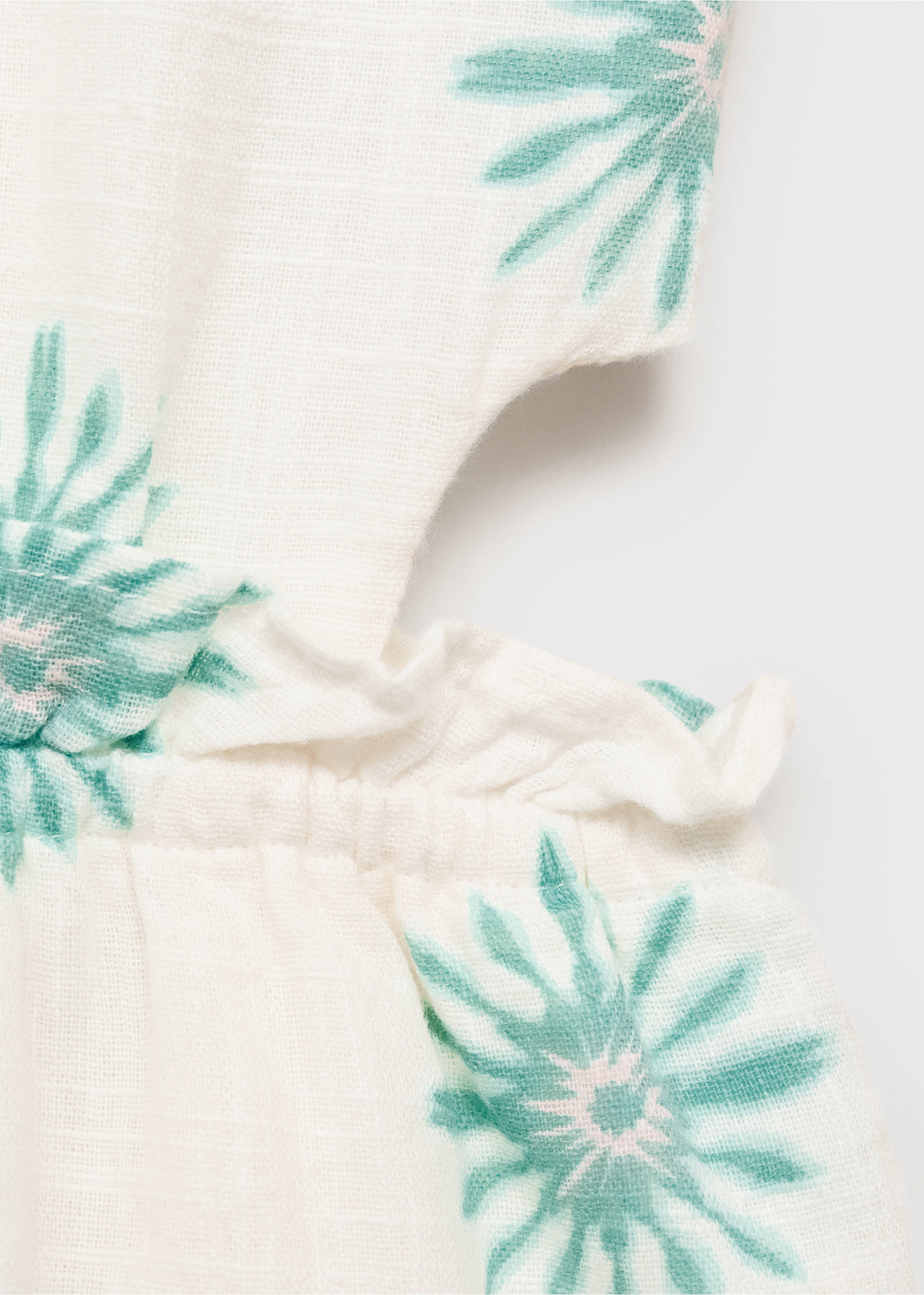 Printed jumpsuit with openings - Details of the article 0, White. Ref: 87097695-00.