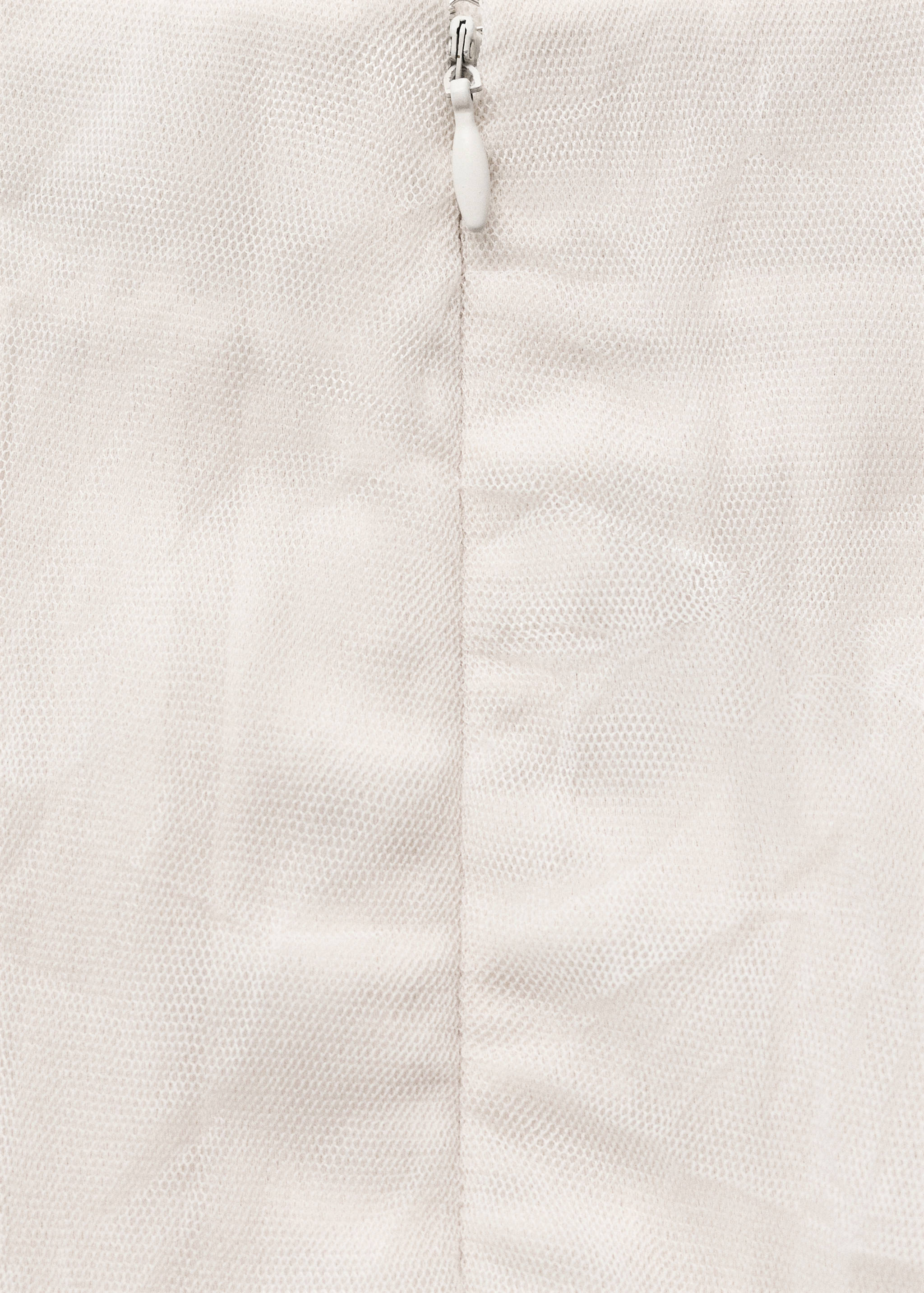 Saia reta de tule - Pormenor do artigo 8