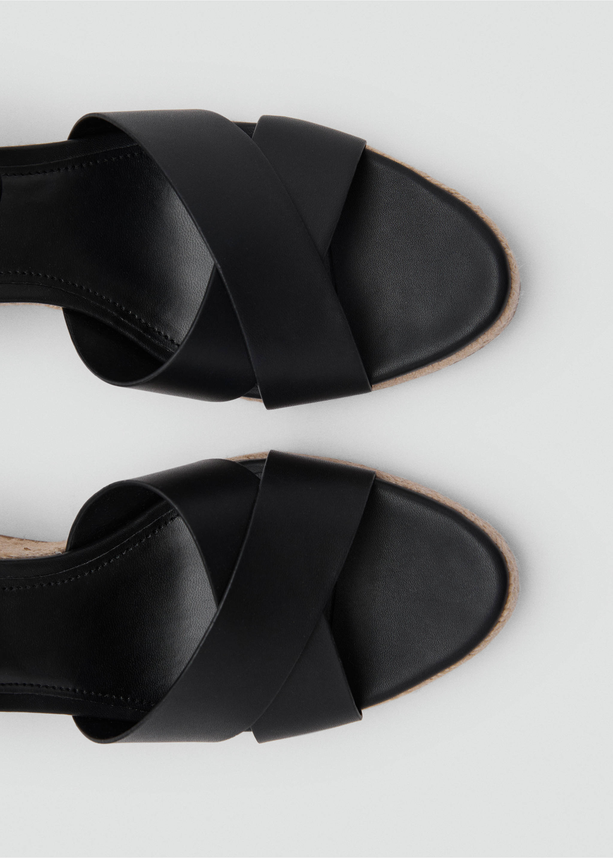 Wedge sandals with crisscross straps - Details of the article 1, Black. Ref: 87098258-00.