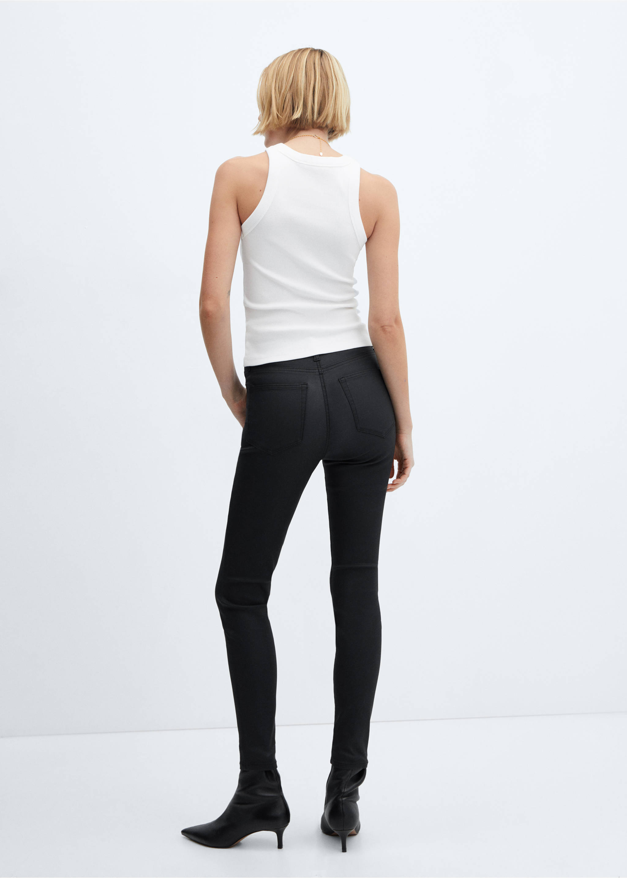 Jean skinny taille haute enduit - Verso de l’article, Noir. Ref: 87110266-00.