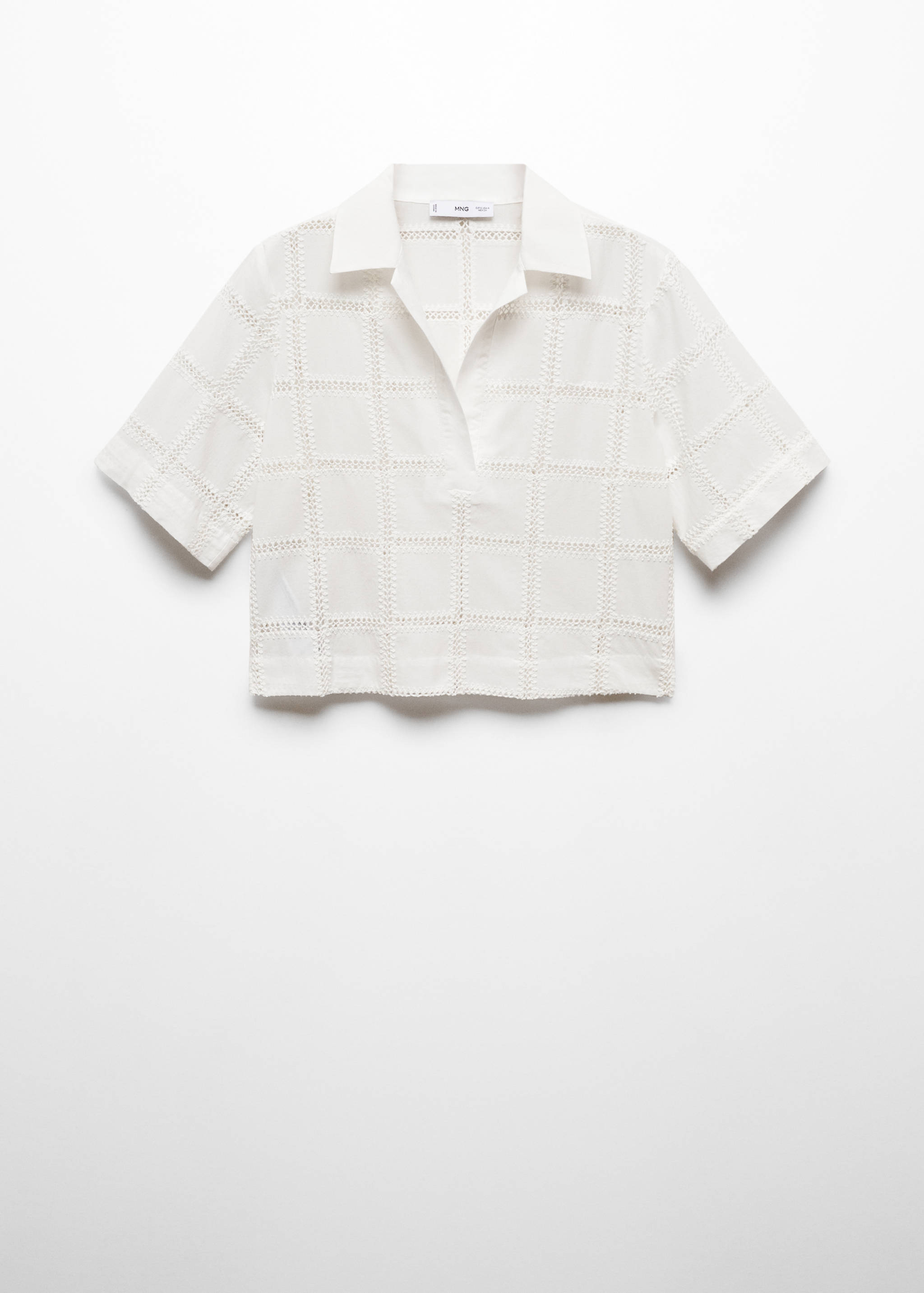 Blusa ricamata collo a polo - Articolo senza modello