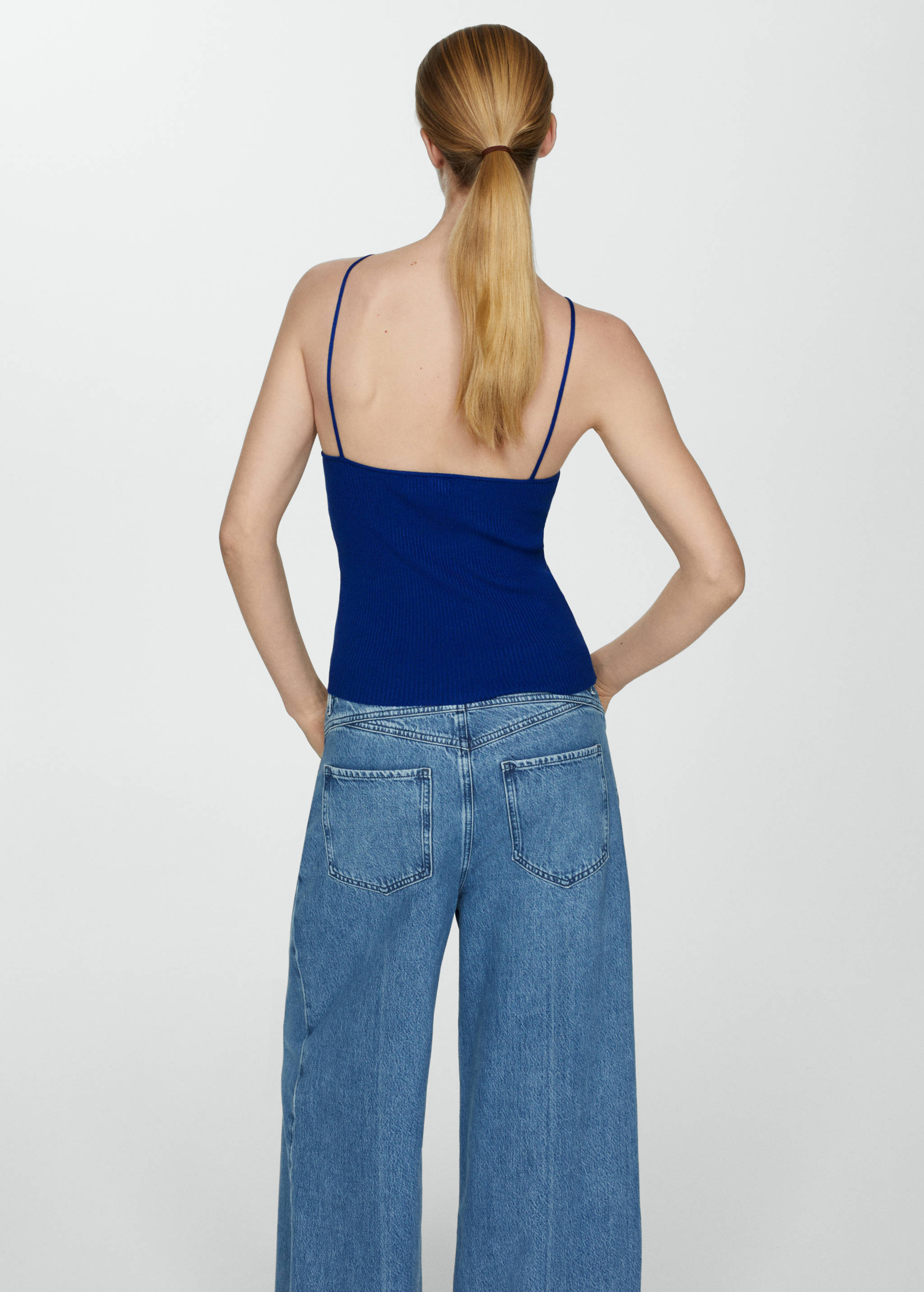 Knitted top with metallic thread - Reverse of the article