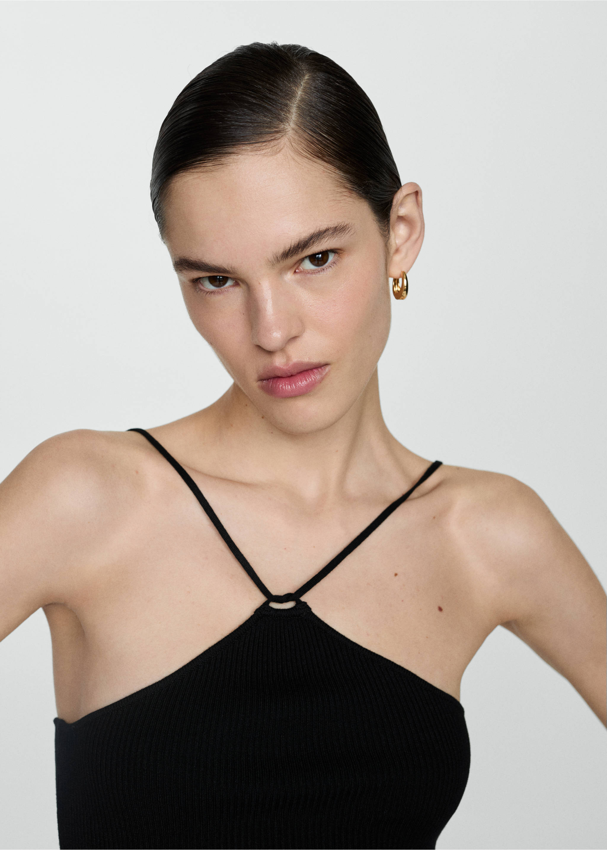 Knitted top with metallic thread - Details of the article 1, Black. Ref: 87188645-00.
